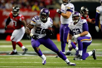 ATLANTA, GA - NOVEMBER 29:  Adrian Peterson #28 of the Minnesota Vikings runs the ball during the second half against the Atlanta Falcons at the Georgia Dome on November 29, 2015 in Atlanta, Georgia.  (Photo by Kevin C. Cox/Getty Images)