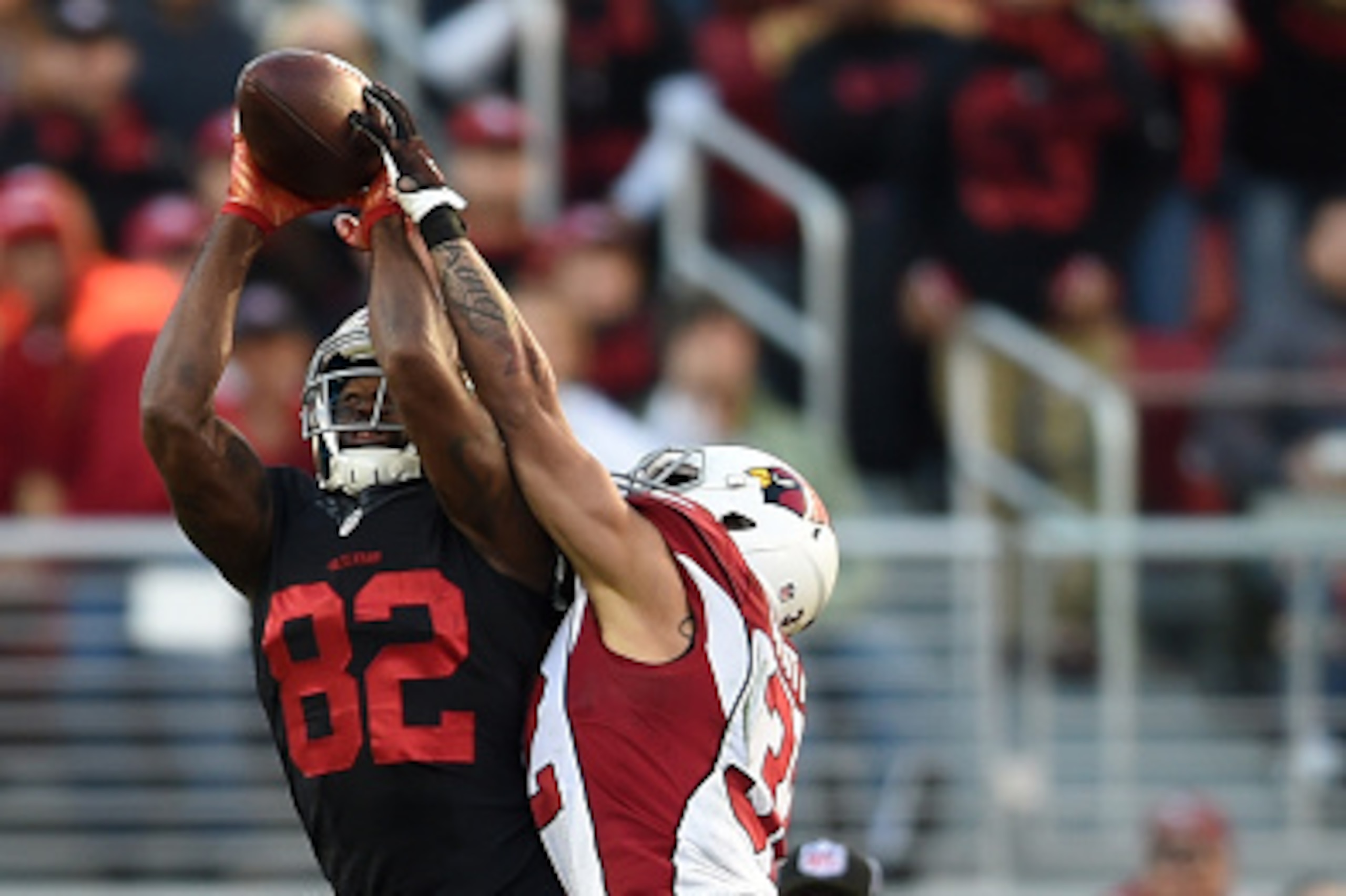 SANTA CLARA, CA - NOVEMBER 29: Torrey Smith #82 of the San Francisco 49ers makes a 41-yard catch against the Arizona Cardinals during their NFL game at Levi's Stadium on November 29, 2015 in Santa Clara, California. (Photo by Thearon W. Henderson/Getty SANTA CLARA, CA - NOVEMBER 29: Torrey Smith #82 of the San Francisco 49ers makes a 41-yard catch against the Arizona Cardinals during their NFL game at Levi's Stadium on November 29, 2015 in Santa Clara, California. (Photo by Thearon W. Henderson/Getty