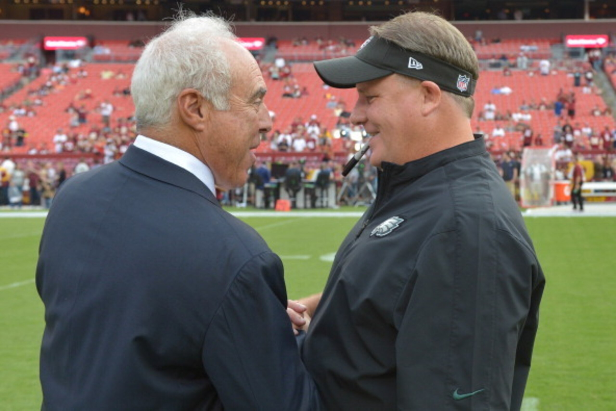 LANDOVER, MD - AUGUST 09: Owner Jeffrey Lurie of the Philadelphia Eagles and head coach Chip Kelly shake hands before the game at FedEx Field on September 9, 2013 in Landover, Maryland. The Eagles won 33-27. (Photo by Drew Hallowell/Philadelphia Eagles/Ge