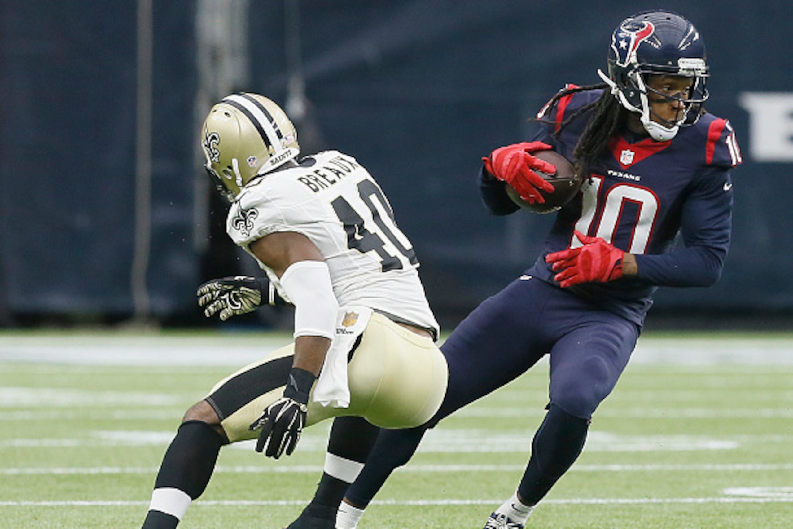 HOUSTON, TX - NOVEMBER 29: DeAndre Hopkins #10 of the Houston Texans runs after the catch against Delvin Breaux #40 of the New Orleans Saints in the second quarter on November 29, 2015 at NRG Stadium in Houston, Texas. (Photo by Bob Levey/Getty Images) HOUSTON, TX - NOVEMBER 29: DeAndre Hopkins #10 of the Houston Texans runs after the catch against Delvin Breaux #40 of the New Orleans Saints in the second quarter on November 29, 2015 at NRG Stadium in Houston, Texas. (Photo by Bob Levey/Getty Images)