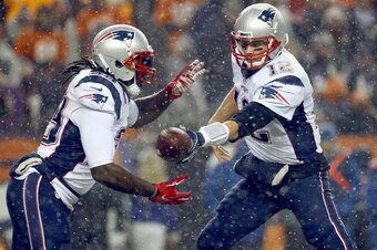 Tom Brady handing off to LeGarrette Blount.