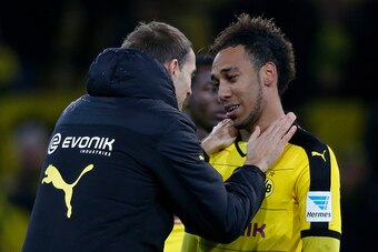 Dortmund's Gabonese striker Pierre-Emerick Aubameyang (R) and Dortmund's head coach Thomas Tuchel celebrate after the German first division Bundesliga football match Borussia Dortmund vs VfB Stuttgart, in Dortmund, western Germany, on November 29, 2015. D