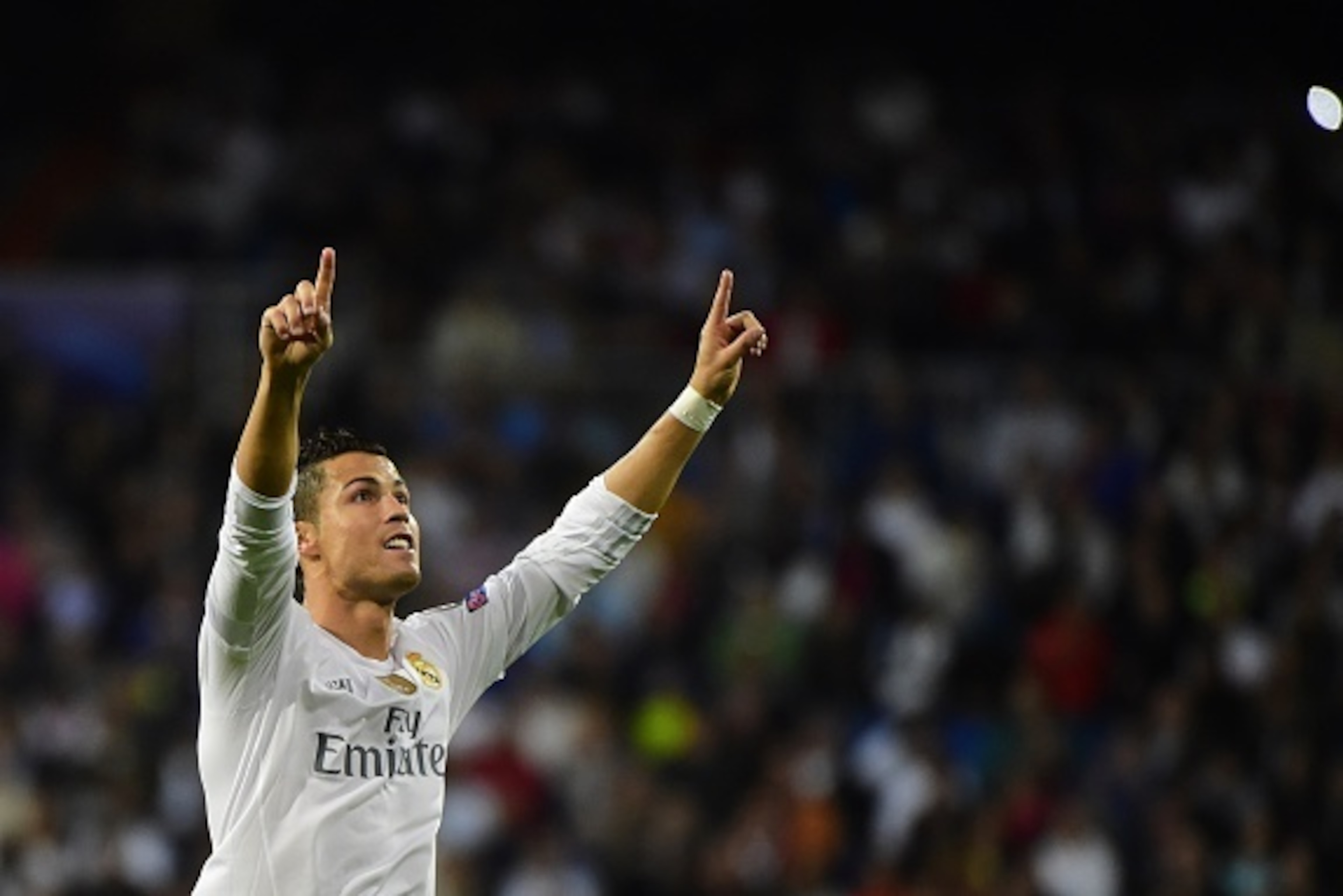 Real Madrid's Portuguese forward Cristiano Ronaldo celebrates his second goal during the UEFA Champions League group A football match Real Madrid CF vs FC Shakhtar Donetsk at the Santiago Bernabeu stadium in Madrid on September 15, 2015. AFP PHOTO/ PIERRE Real Madrid's Portuguese forward Cristiano Ronaldo celebrates his second goal during the UEFA Champions League group A football match Real Madrid CF vs FC Shakhtar Donetsk at the Santiago Bernabeu stadium in Madrid on September 15, 2015. AFP PHOTO/ PIERRE