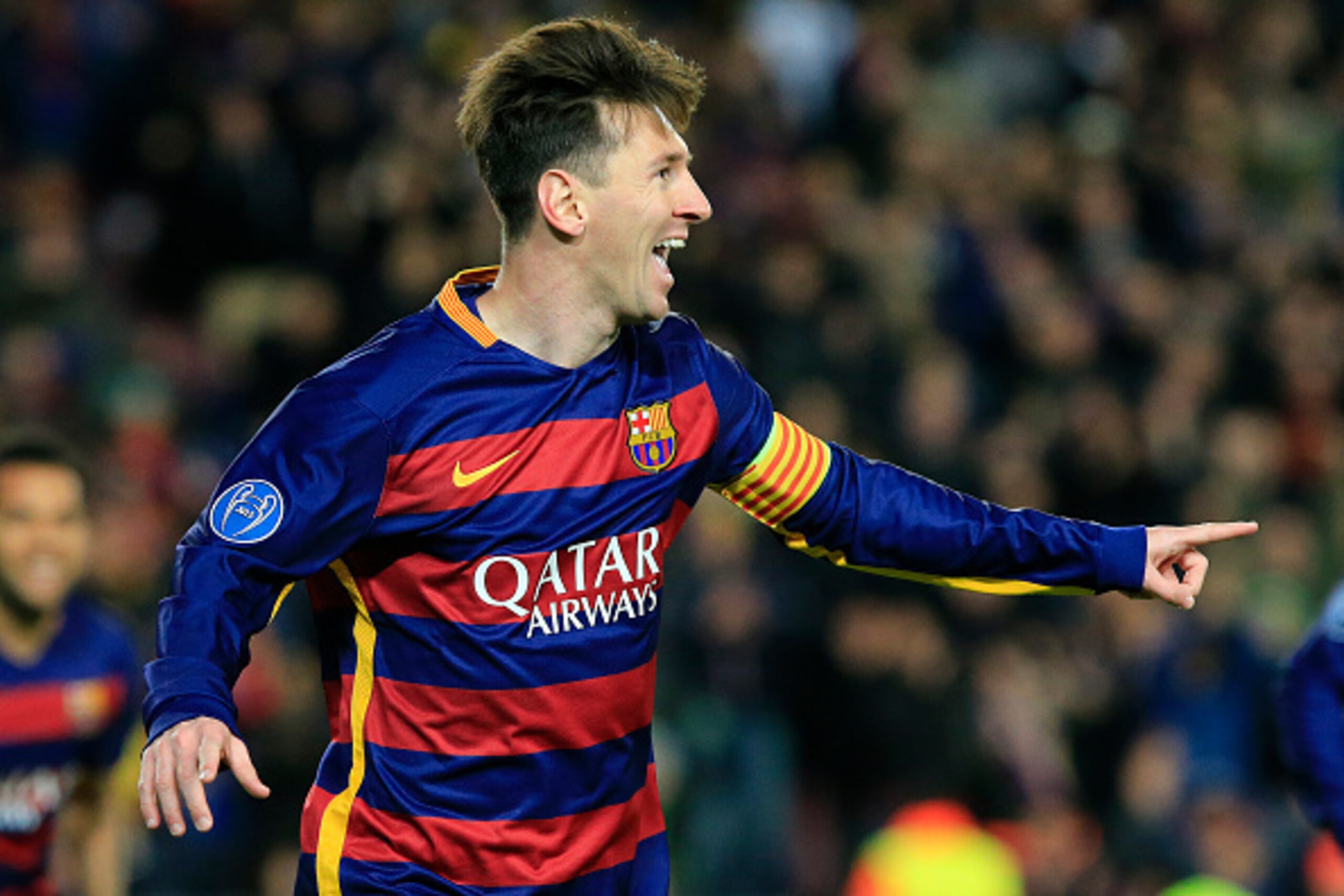 FC Barcelona's Argentinian forward Lionel Messi celebrates after scoring during the UEFA Champions League Group E football match FC Barcelona vs AS Roma at the Camp Nou stadium in Barcelona on November 24, 2015.   AFP PHOTO/ PAU BARRENA / AFP / PAU BARREN