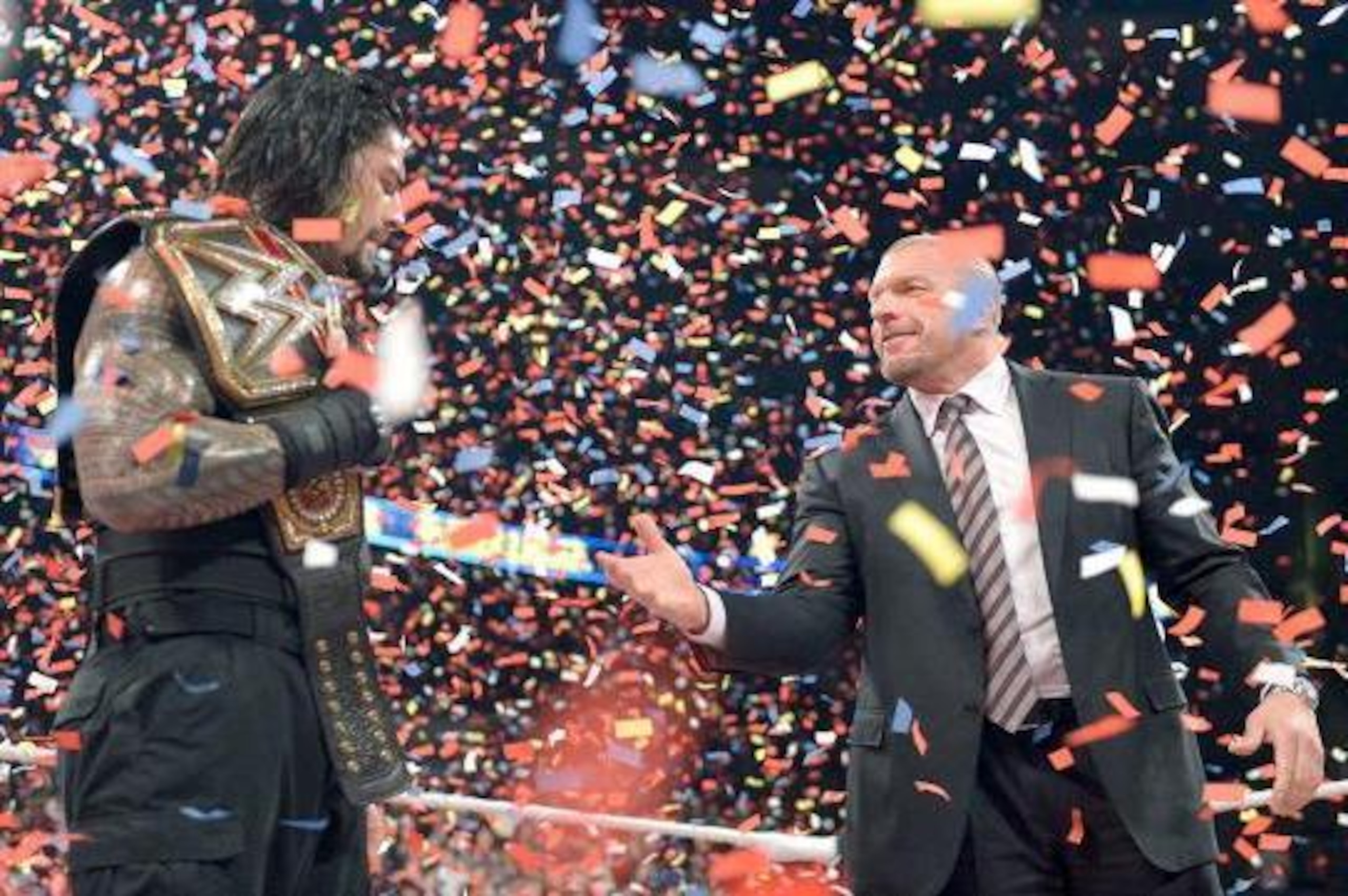 Triple H tries to congratulate Roman Reigns at Survivor Series.