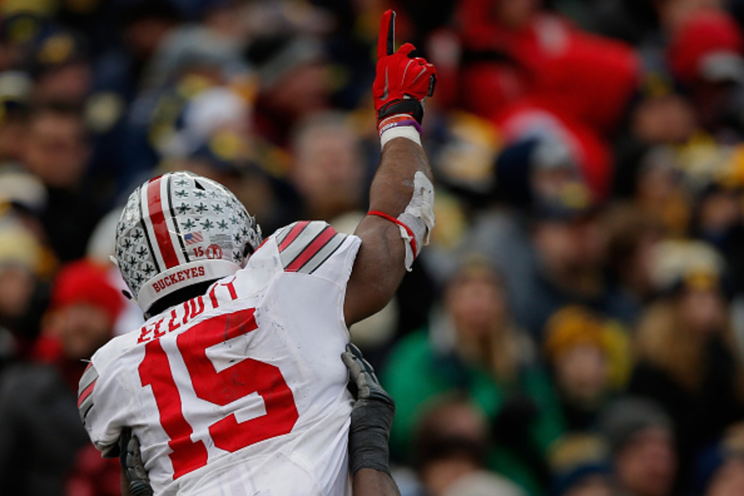 ANN ARBOR, MI - NOVEMBER 28: Running back Ezekiel Elliott #15 of the Ohio State Buckeyes celebrates after scoring a fourth quarter touchdown against the Michigan Wolverines at Michigan Stadium on November 28, 2015 in Ann Arbor, Michigan.  (Photo by Gregor
