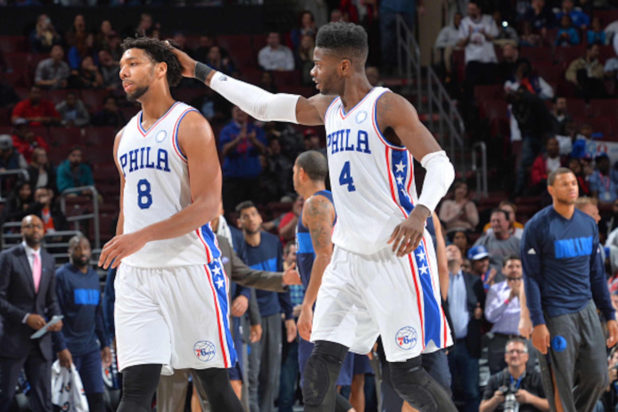 PHILADELPHIA,PA - NOVEMBER 16: Jahlil Okafor #8 and Nerlens Noel #4 of the Philadelphia 76ers share a moment against the Dallas Mavericks at Wells Fargo Center on November 16, 2015 in Philadelphia, Pennsylvania NOTE TO USER: User expressly acknowledges an