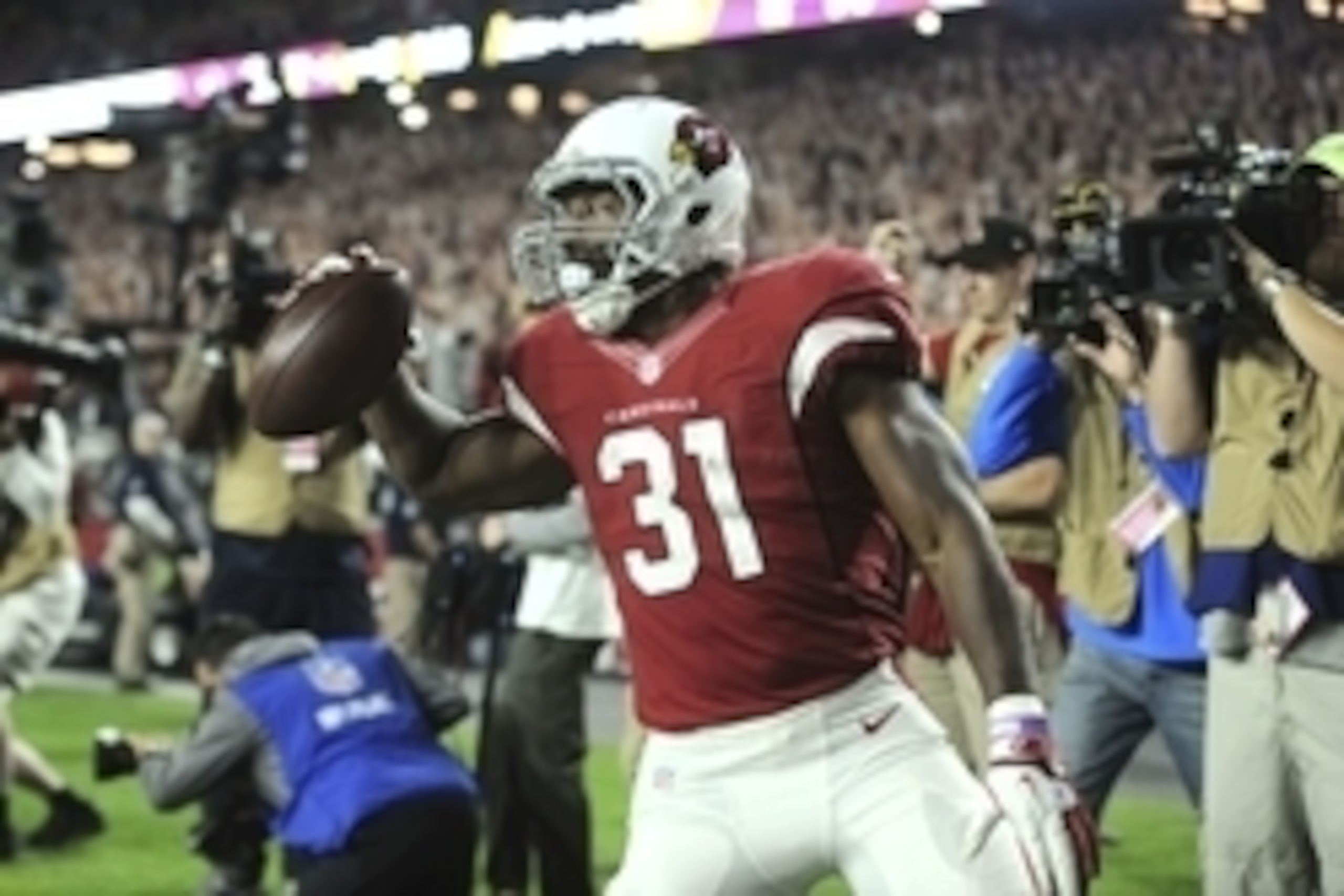 Nov 22, 2015; Glendale, AZ, USA; Arizona Cardinals running back David Johnson (31) celebrates a touchdown against the Cincinnati Bengals during the second half at University of Phoenix Stadium. The Cardinals won 34-31. Mandatory Credit: Joe Camporeale-USA