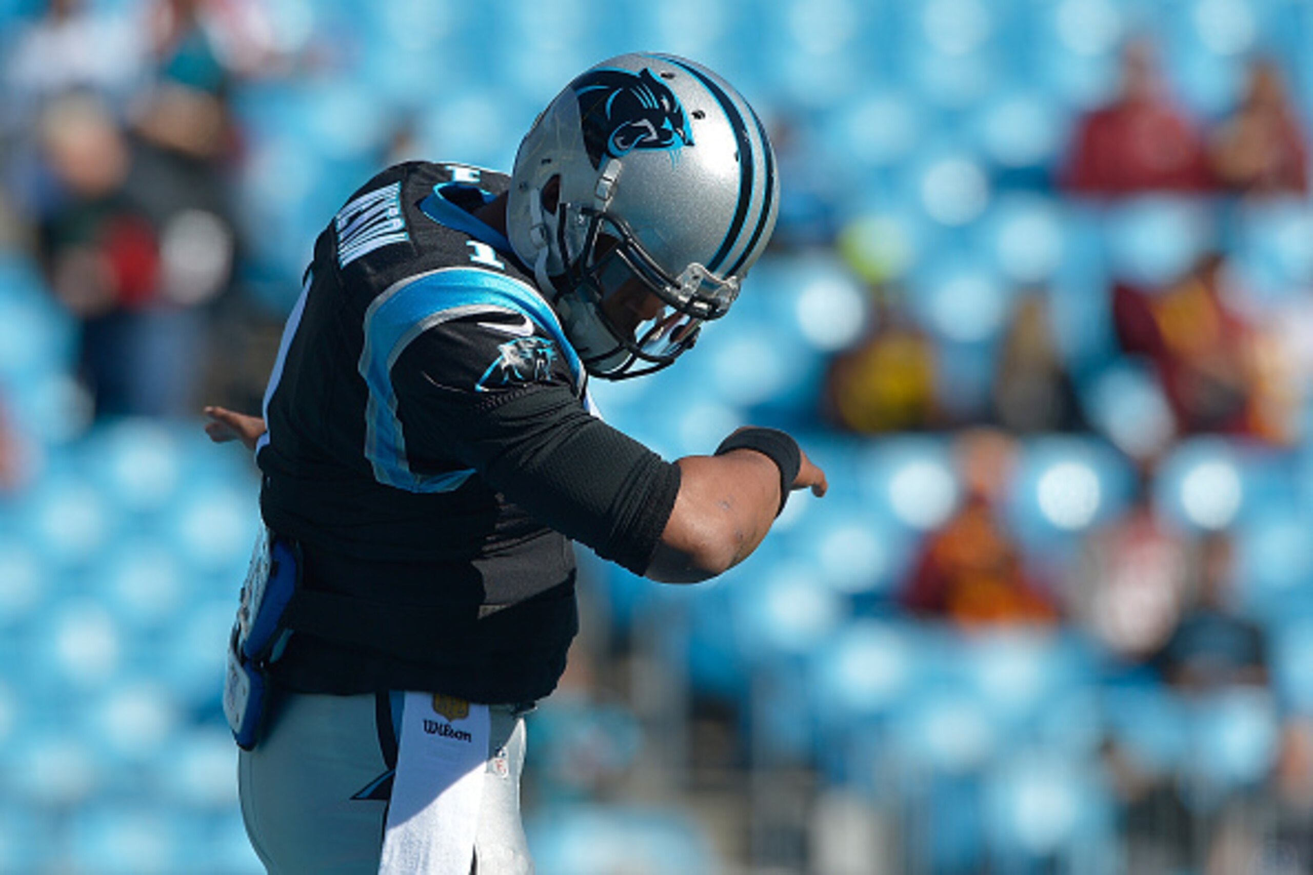 CHARLOTTE, NC - NOVEMBER 22:  Cam Newton #1 of the Carolina Panthers dances The Dab as he warms up during their game against the Washington Redskins at Bank of America Stadium on November 22, 2015 in Charlotte, North Carolina. The Panthers won 44-16.  (Ph