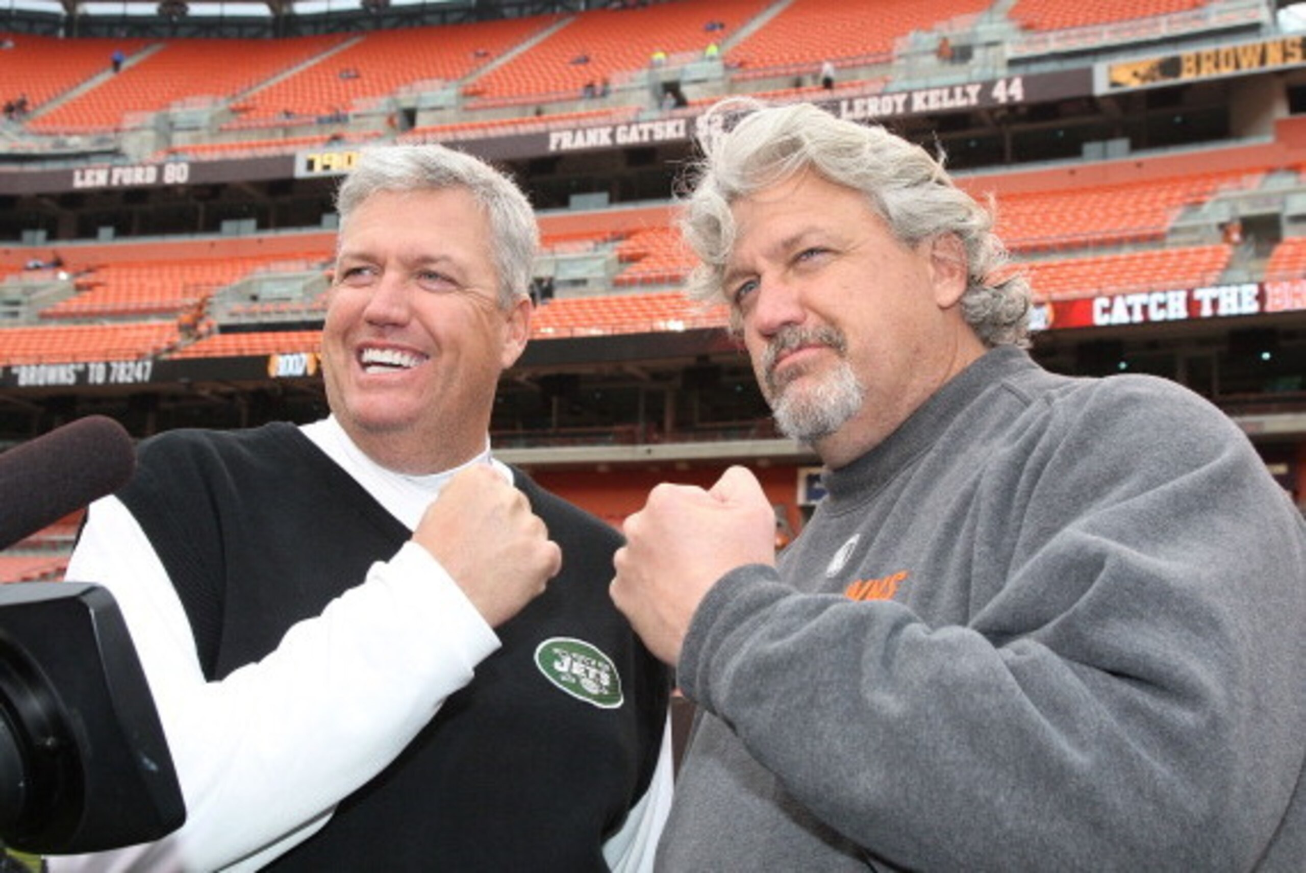 CLEVELAND - NOVEMBER 14:  Head Coach Rex Ryan of the New York Jets meets with his twin brother, Defensive Coordinator Rob Ryan of the Cleveland Browns when the Cleveland Browns host the New York Jets at Cleveland Browns Stadium on November 14, 2010 in Cle