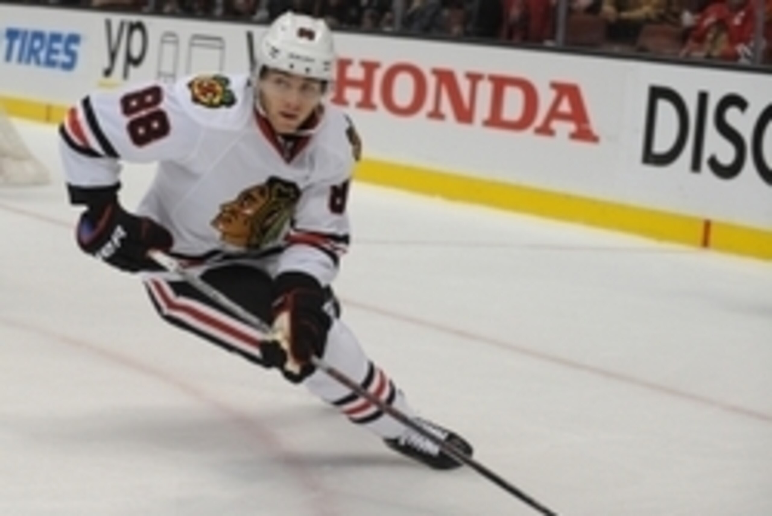 November 27, 2015; Anaheim, CA, USA; Chicago Blackhawks right wing Patrick Kane (88) moves the puck against Anaheim Ducks during the first period at Honda Center. Mandatory Credit: Gary A. Vasquez-USA TODAY Sports