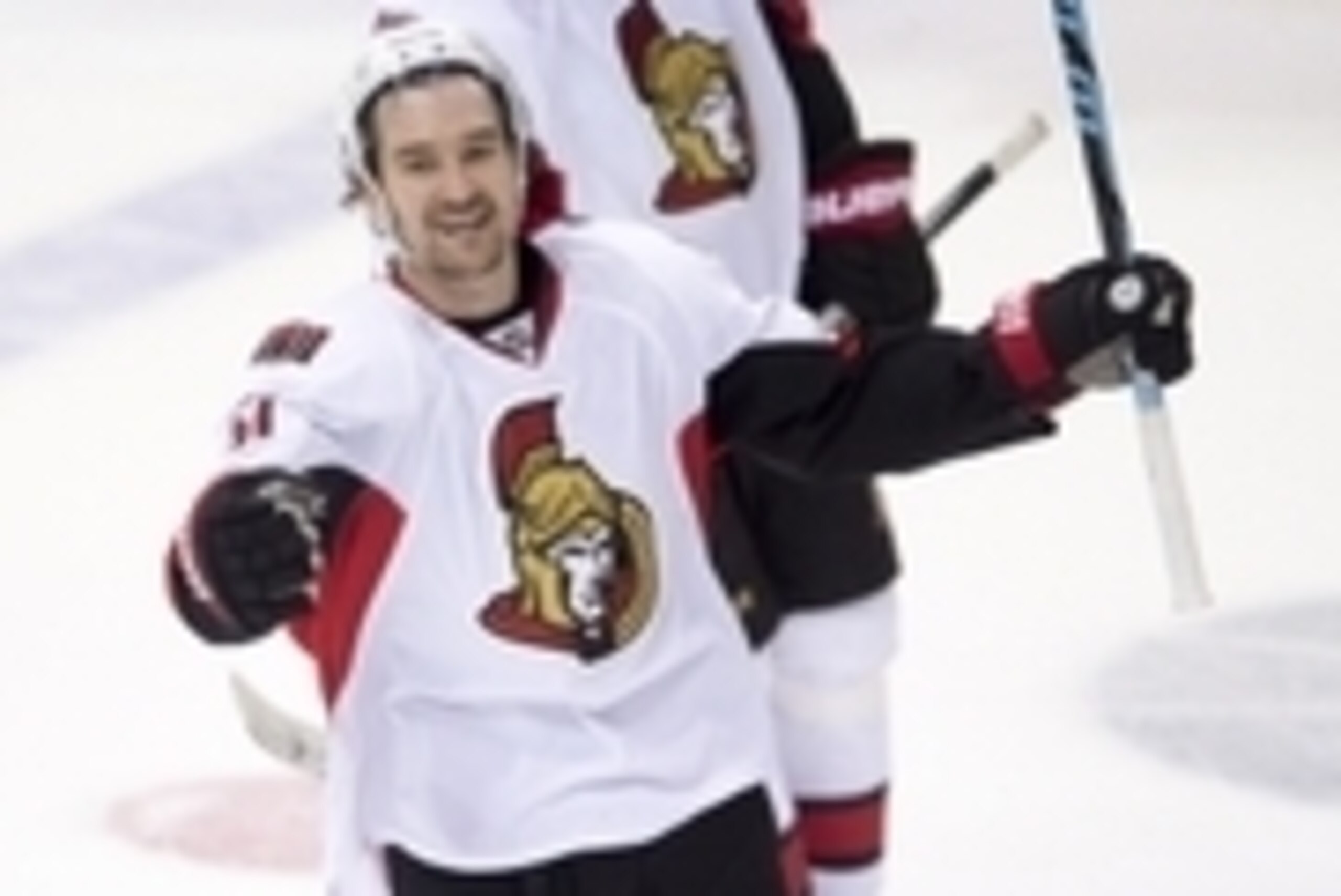 Nov 24, 2015; Dallas, TX, USA; Ottawa Senators right wing Mark Stone (61) celebrates after an empty net goal by left wing Mike Hoffman (not pictured) during the third period against the Dallas Stars at the American Airlines Center. The Senators won 7-4. M