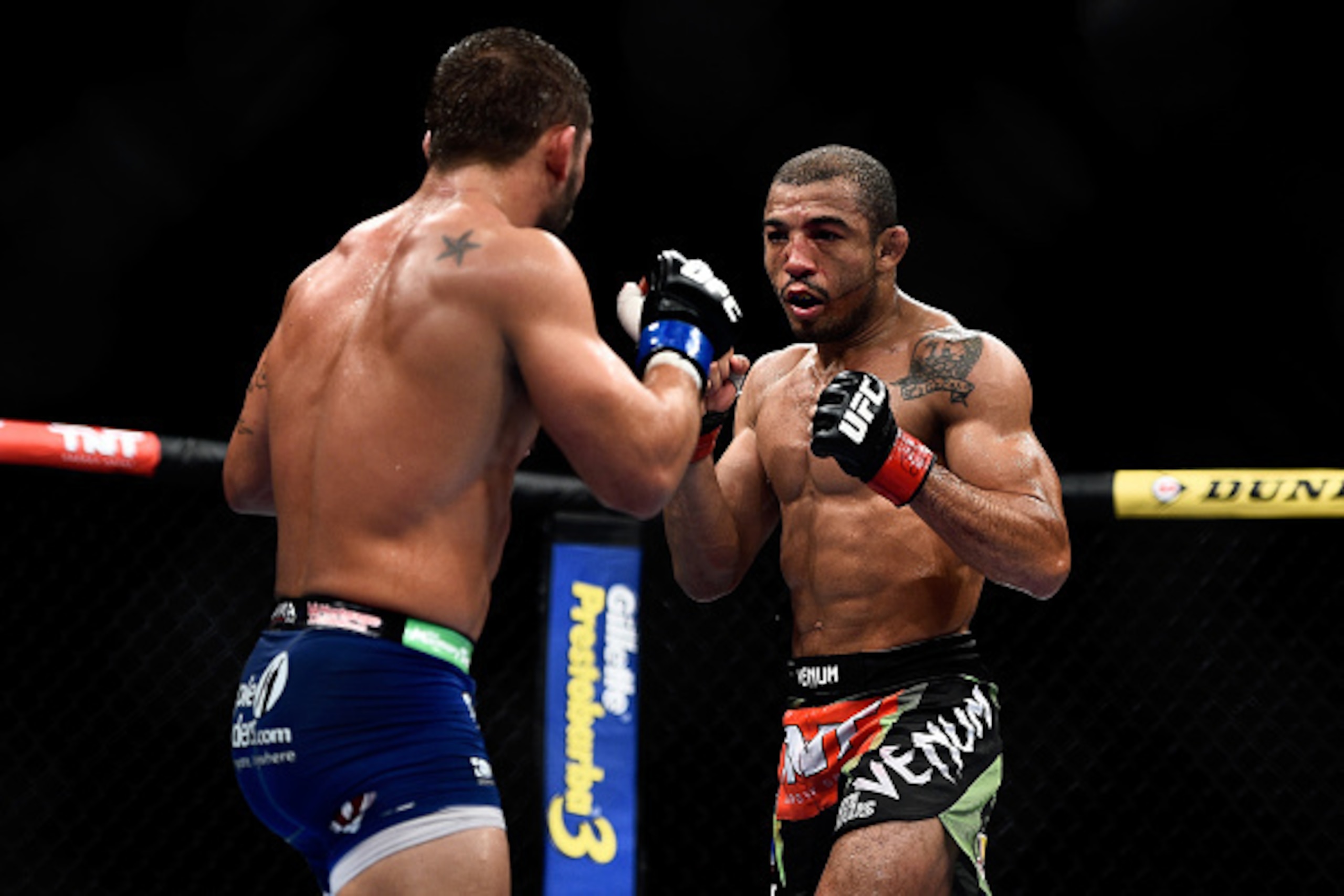 RIO DE JANEIRO, BRAZIL - OCTOBER 25: Chad Mendes of the United States and Jose Aldo of Brazil in their featherweight championship bout during the UFC 179 event at Maracanazinho on October 25, 2014 in Rio de Janeiro, Brazil. (Photo by Buda Mendes/Getty Ima