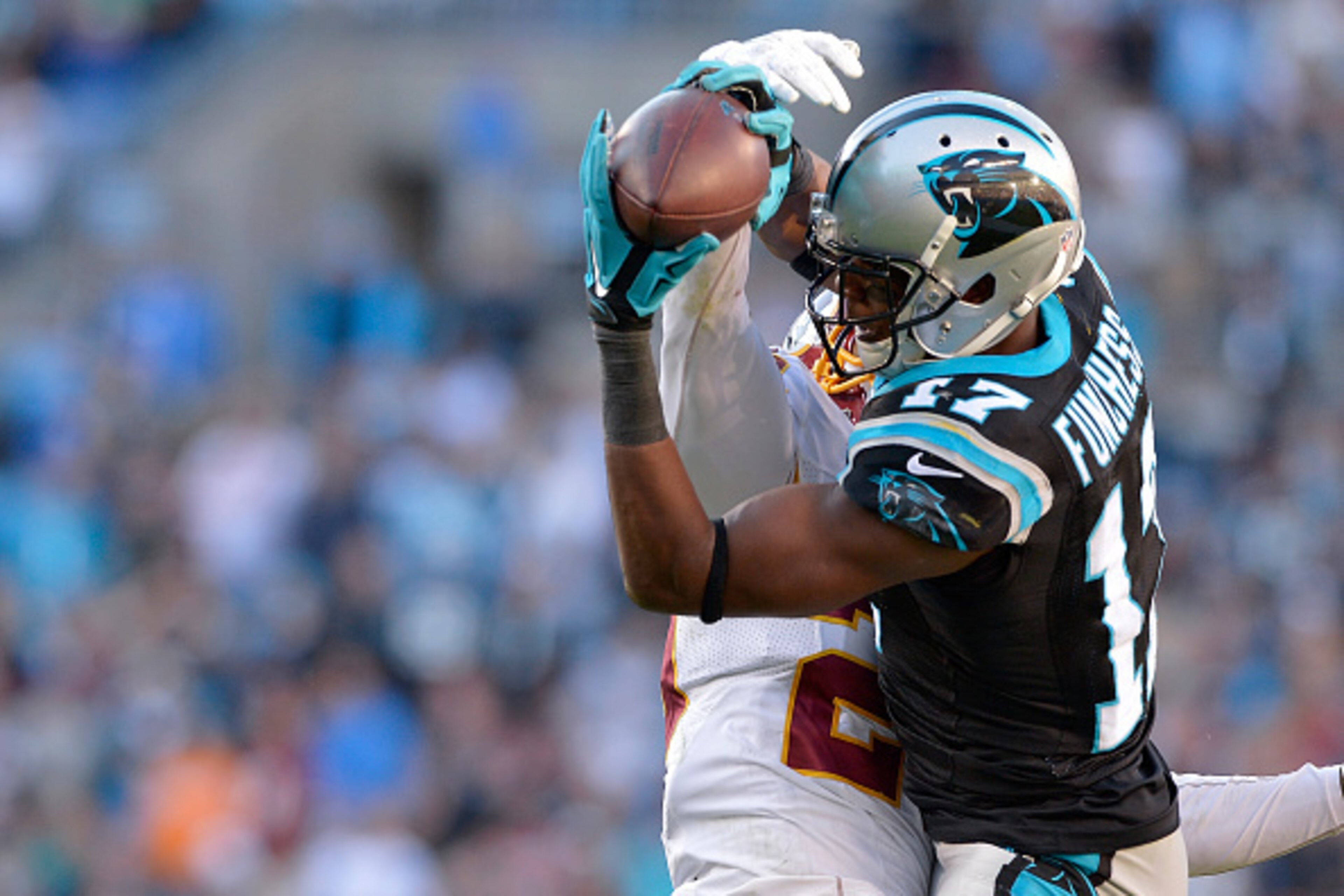 CHARLOTTE, NC - NOVEMBER 22:  Devin Funchess #17 of the Carolina Panthers makes a catch against Chris Culliver #29 of the Washington Redskins during their game at Bank of America Stadium on November 22, 2015 in Charlotte, North Carolina.  (Photo by Grant 