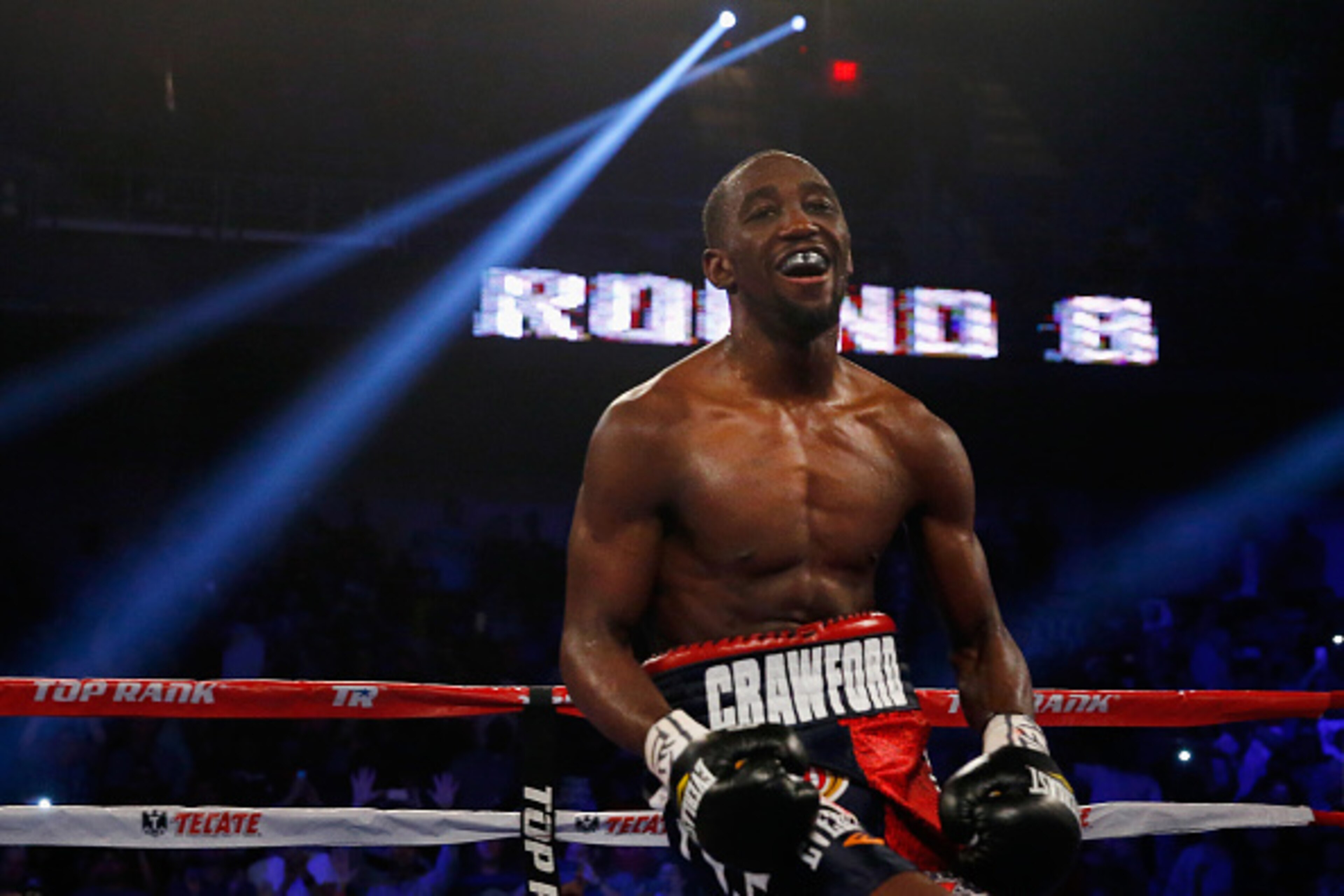 ARLINGTON, TX - APRIL 18:  Terence Crawford celebrates after beating Thomas Dulorme of Puerto Rico in the sixth round in their WBO Jr. Welterweight Title Bout on April 18, 2015 at College Park Center in Arlington, Texas.  (Photo by Tom Pennington/Getty Im