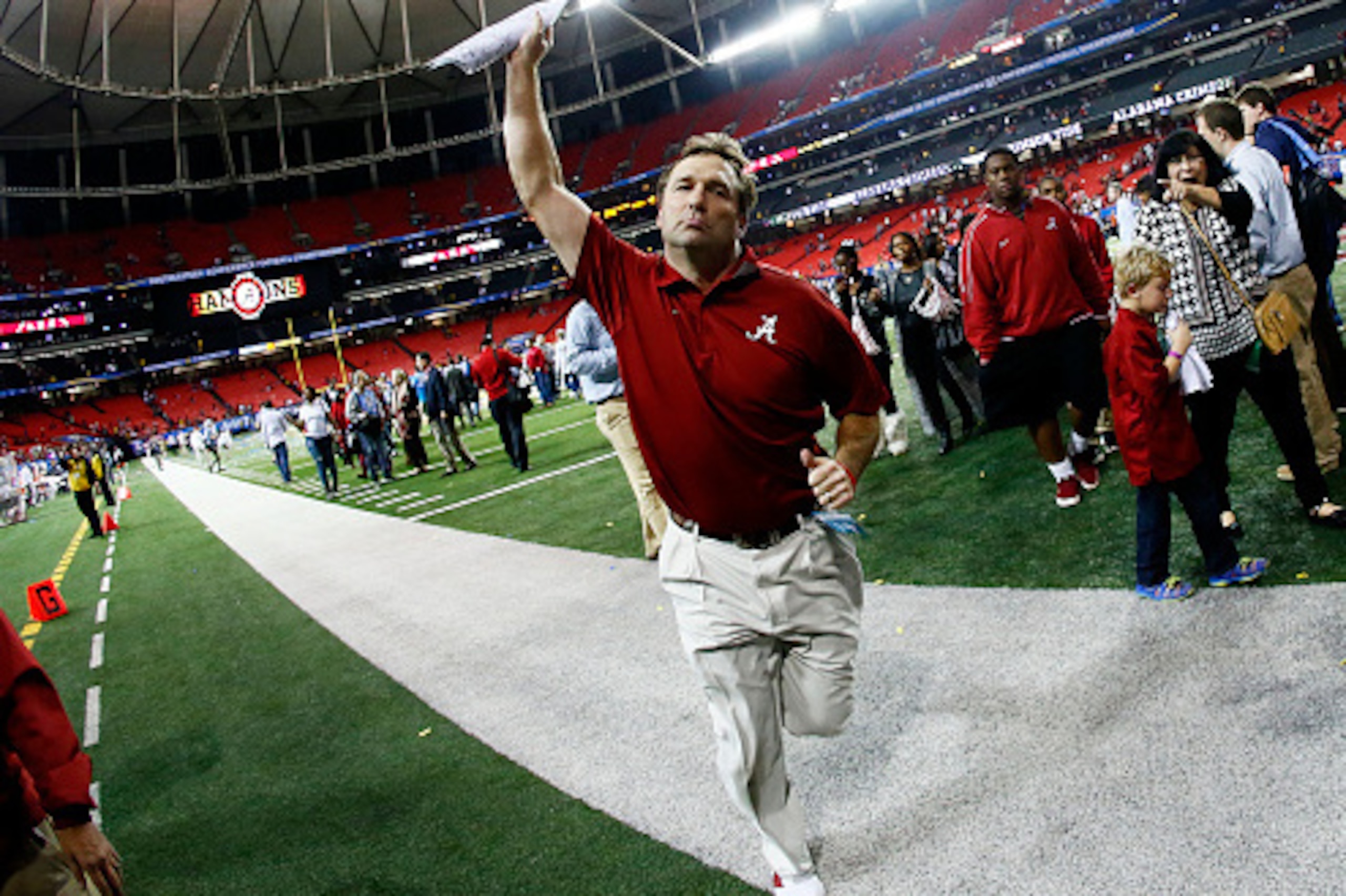 ATLANTA, GA - DECEMBER 06:  Defensive coordinator Kirby Smart of the Alabama Crimson Tide celebrates their 42 to 13 win over the Missouri Tigers in the SEC Championship game at the Georgia Dome on December 6, 2014 in Atlanta, Georgia.  (Photo by Kevin C. 