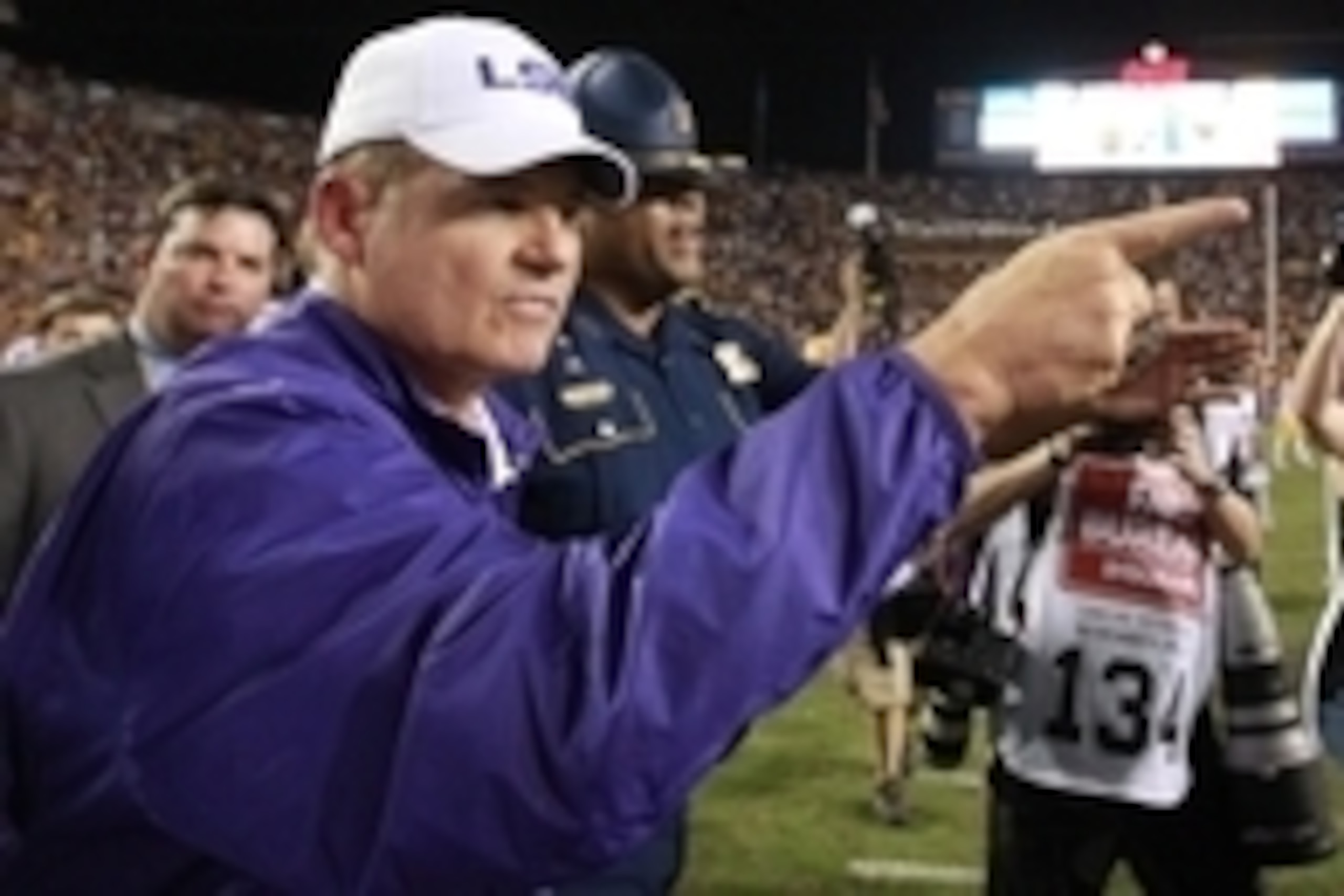 Nov 28, 2015; Baton Rouge, LA, USA; LSU Tigers head coach Les Miles walks onto the field after defeating the Texas A&M Aggies 19-7 at Tiger Stadium. Mandatory Credit: Crystal LoGiudice-USA TODAY Sports