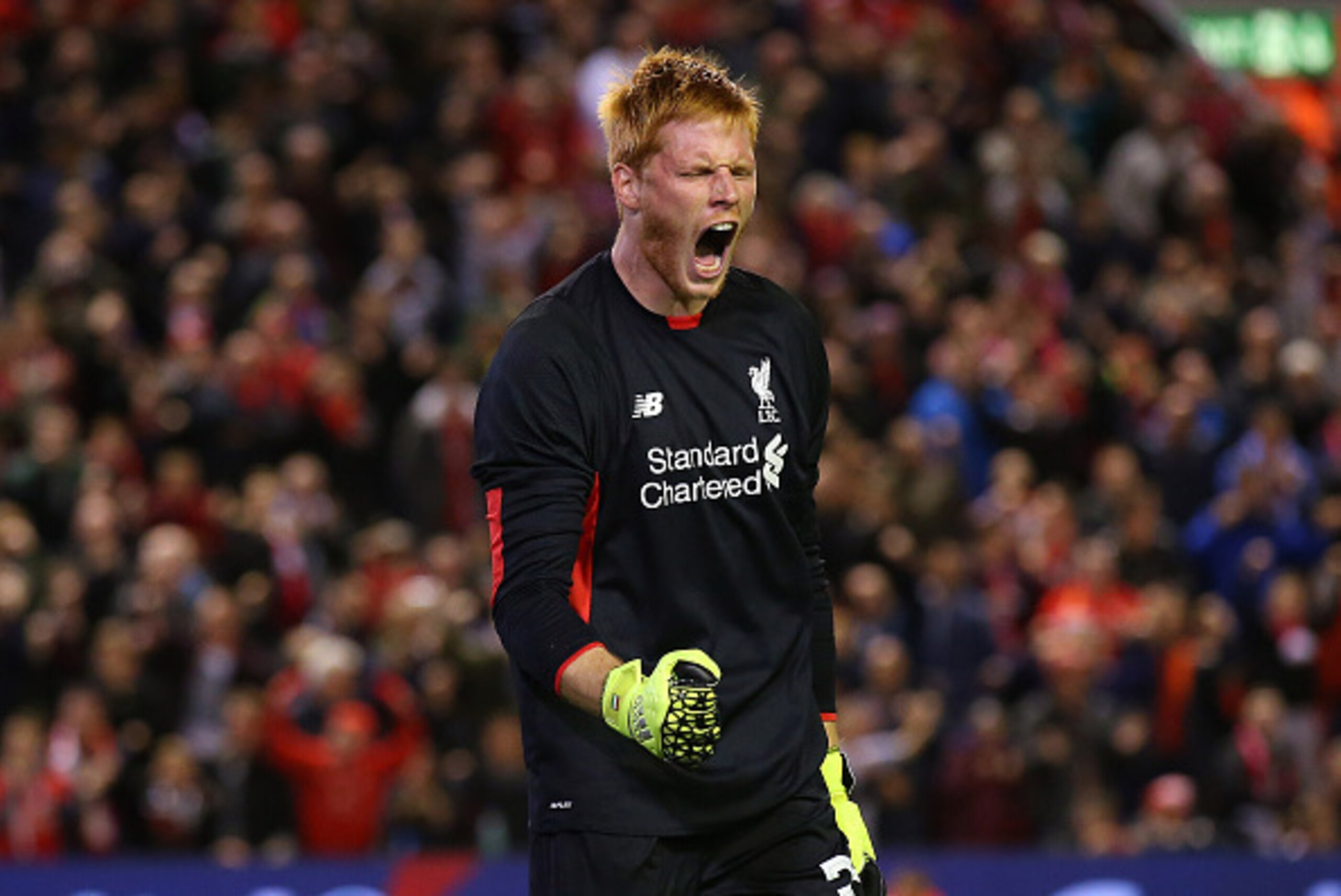 LIVERPOOL, ENGLAND - SEPTEMBER 23:  Adam Bogdan of Liverpool celebrates after saving a penalty from Danny Grainger of Carlisle United during a penalty shoot out in the Capital One Cup Third Round match between Liverpool and Carlisle United at Anfield on S