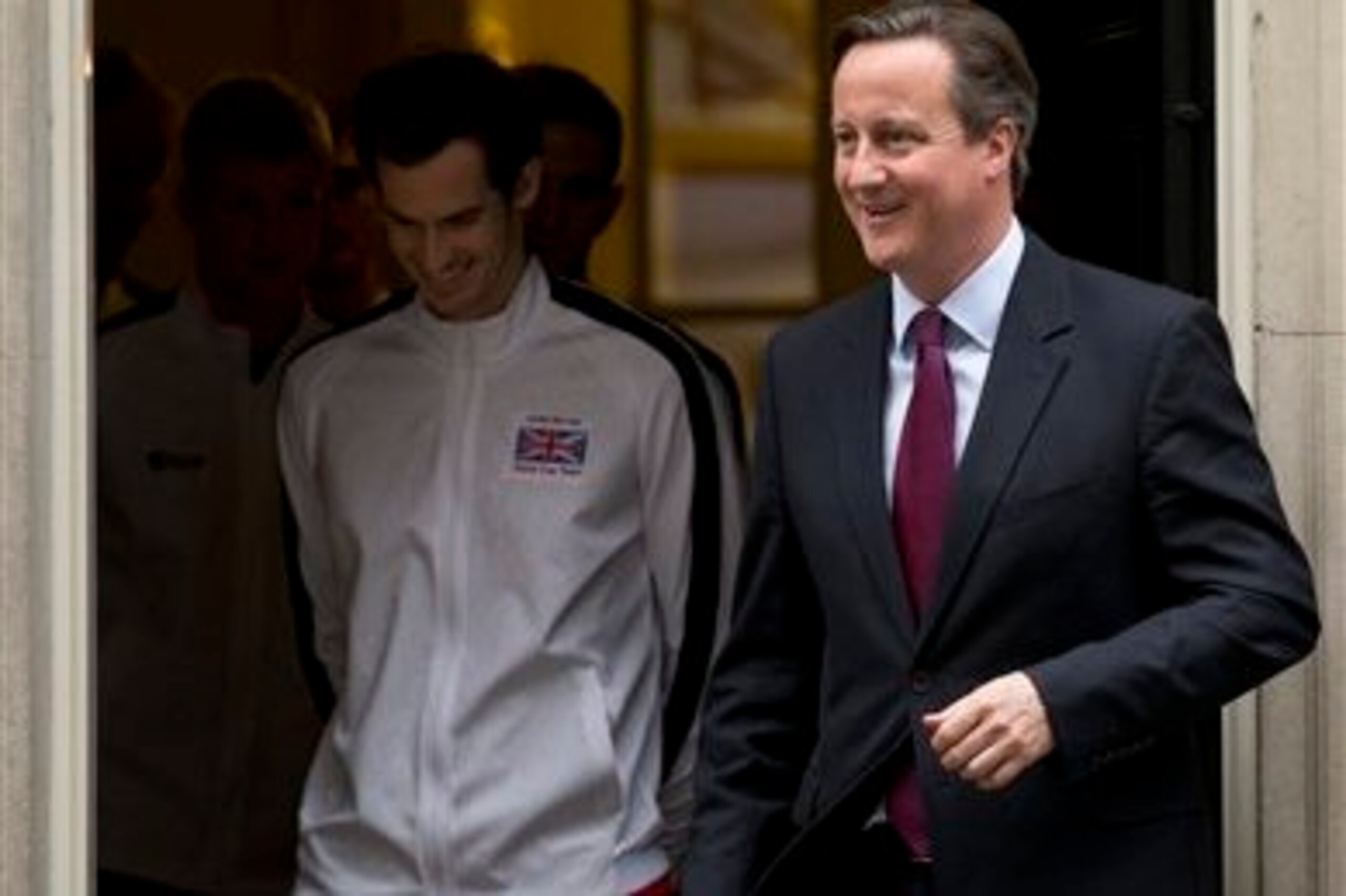 Andy Murray waits in the wings at 10 Downing Street with British Prime Minister David Cameron. Andy Murray waits in the wings at 10 Downing Street with British Prime Minister David Cameron.