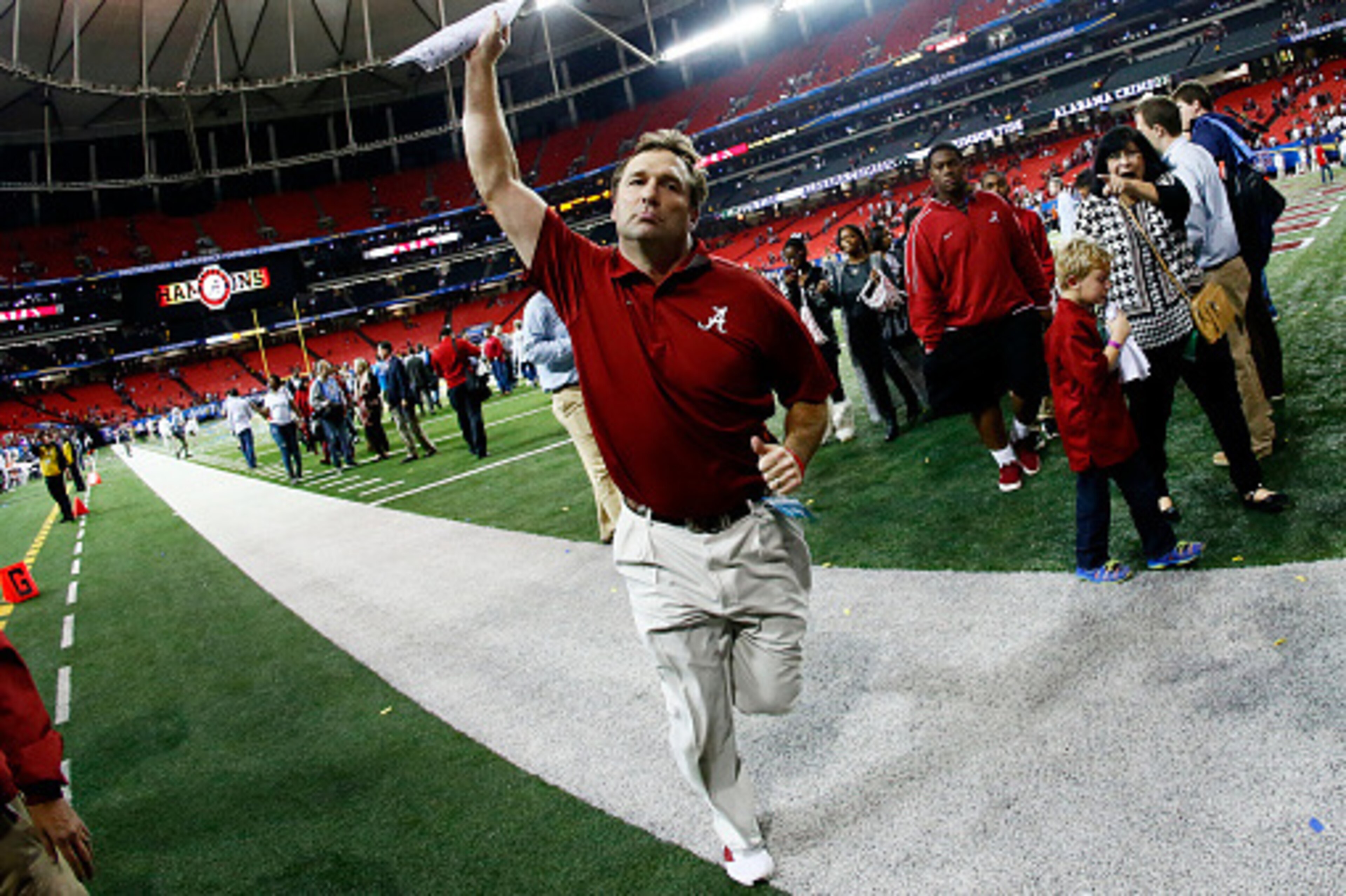 ATLANTA, GA - DECEMBER 06:  Defensive coordinator Kirby Smart of the Alabama Crimson Tide celebrates their 42 to 13 win over the Missouri Tigers in the SEC Championship game at the Georgia Dome on December 6, 2014 in Atlanta, Georgia.  (Photo by Kevin C. 