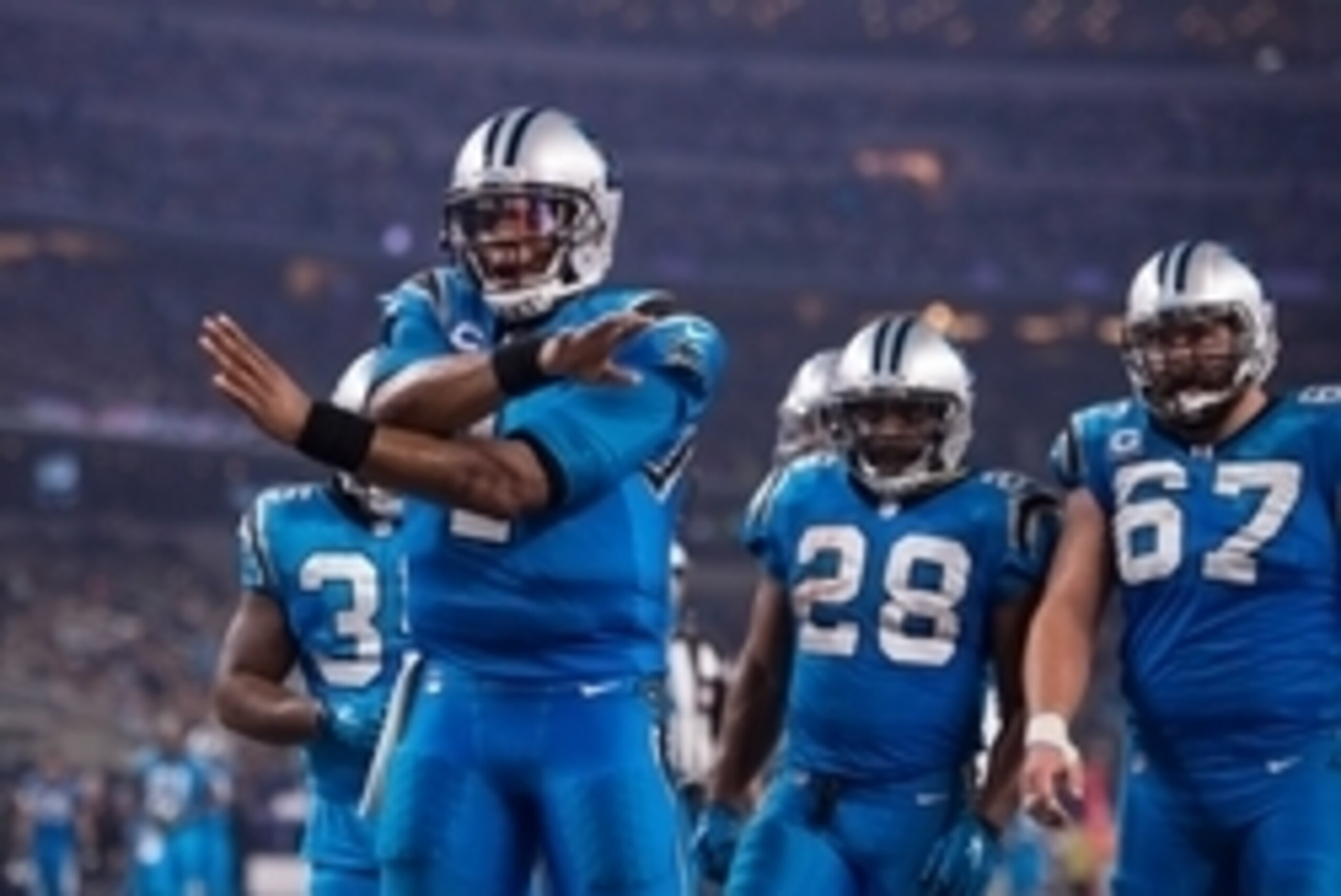 Nov 26, 2015; Arlington, TX, USA; Carolina Panthers quarterback Cam Newton (1) celebrates a touchdown against the Dallas Cowboys during the game on Thanksgiving at AT&T Stadium. The Panthers defeat the Cowboys 33-14. Mandatory Credit: Jerome Miron-USA TOD