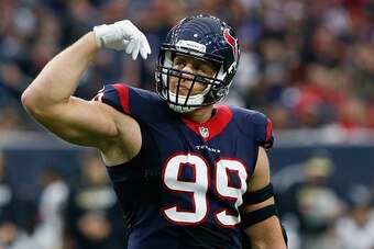 HOUSTON, TX - NOVEMBER 29:  J.J. Watt #99 of the Houston Texans gets the crowd pumped up as they play the New Orleans Saints at NRG Stadium on November 29, 2015 in Houston, Texas.  (Photo by Bob Levey/Getty Images)