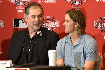 CINCINNATI, OH - JULY 13:  National League All-Stars Bruce Bochy #15 (L) manager of the San Francisco Giants and Zack Greinke #21 of the Los Angeles Dodgers speak to reporters during the MLB All Star Media Availability Day at the Westin Cincinnati Hotel o
