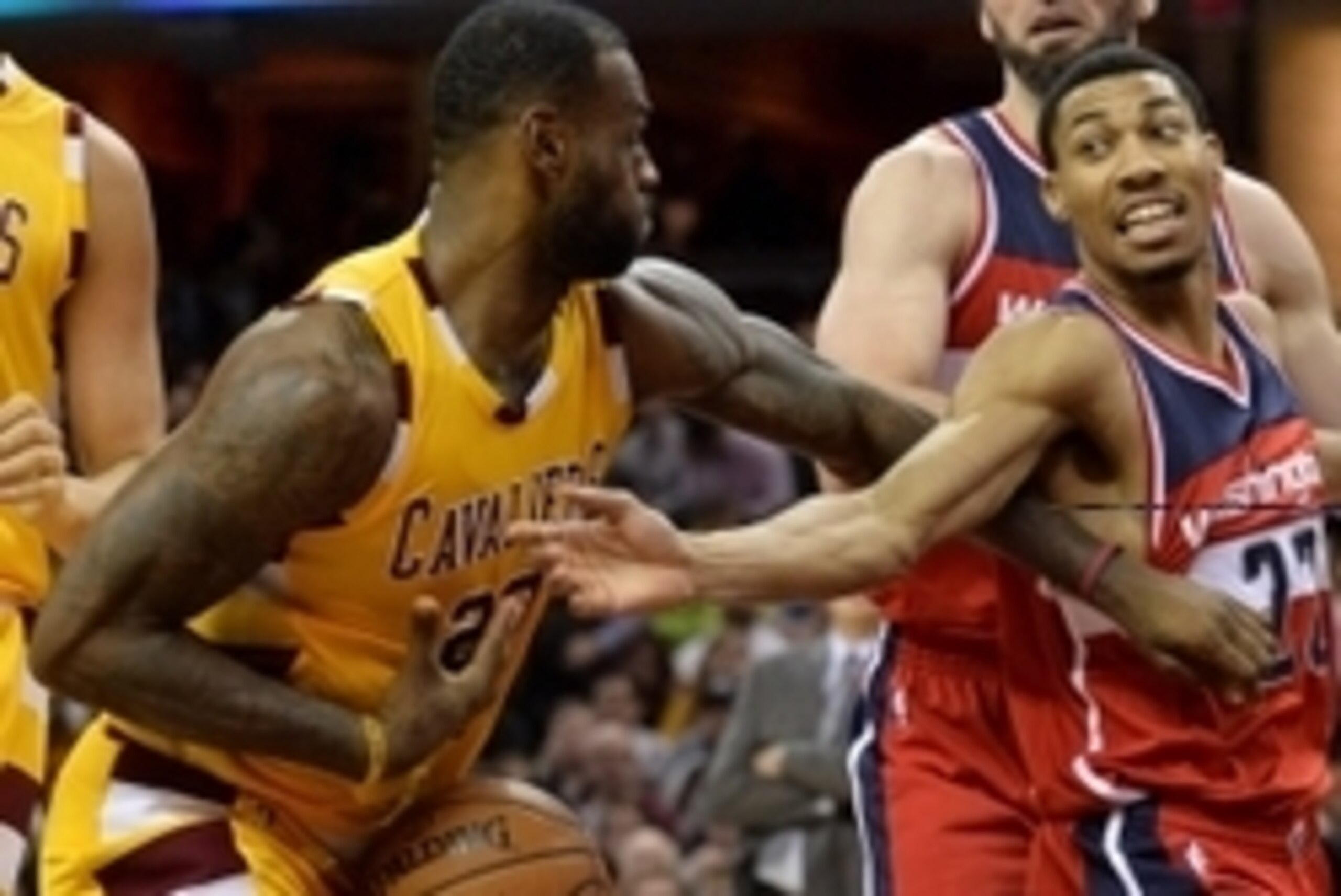 Dec 1, 2015; Cleveland, OH, USA; Washington Wizards forward Otto Porter Jr. (22) knocks the ball away from Cleveland Cavaliers forward LeBron James (23) during the third quarter at Quicken Loans Arena. Mandatory Credit: Ken Blaze-USA TODAY Sports