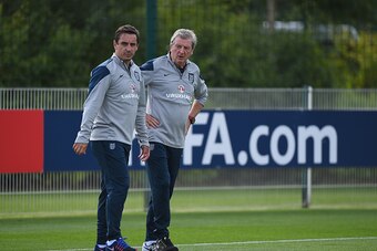 ENFIELD, ENGLAND - SEPTEMBER 07:  England manager Roy Hodgson and assistant Gary Neville during a training session at Tottenham Hotspur Training Centre on September 7, 2015 in Enfield, England.  (Photo by Shaun Botterill/Getty Images)