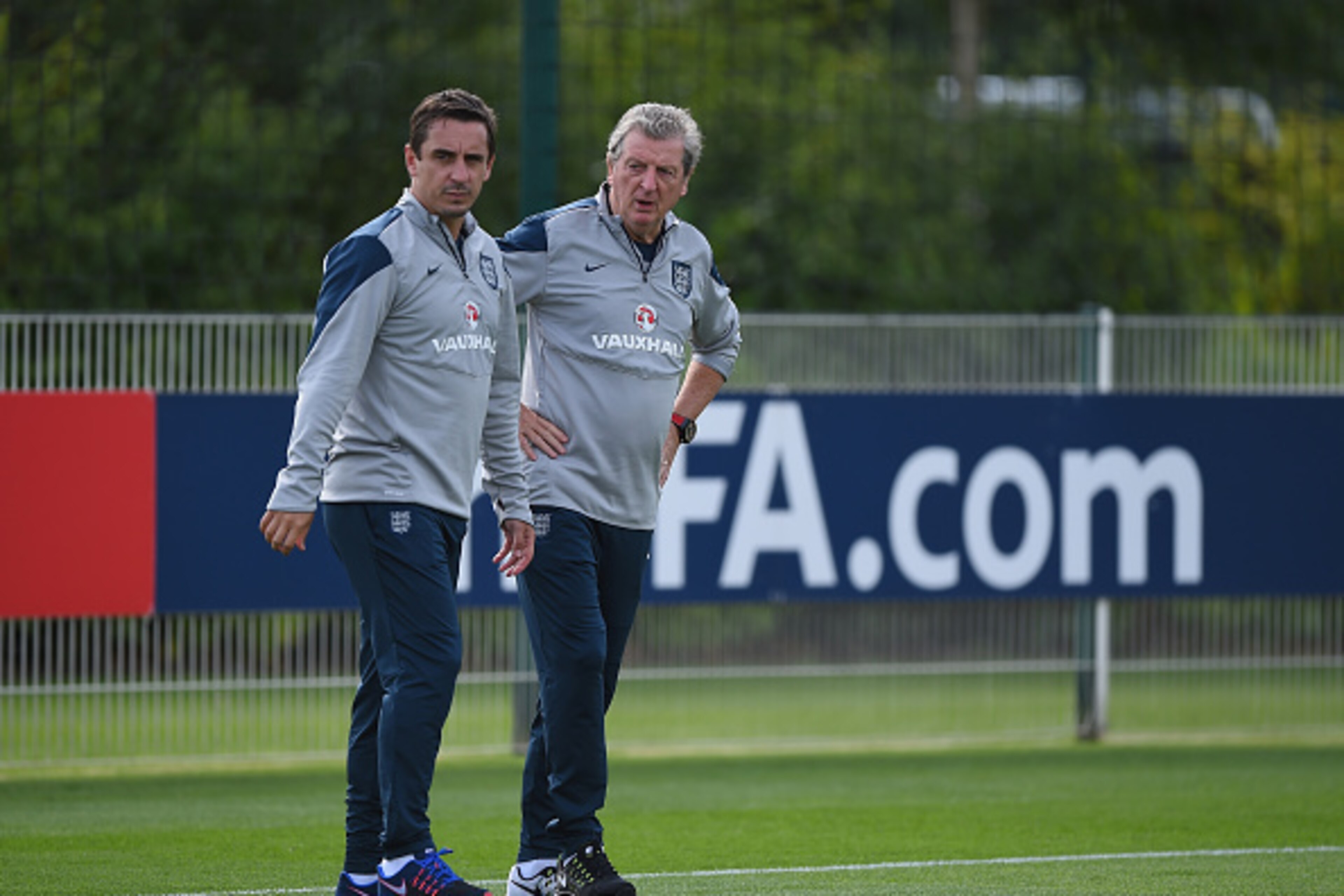 ENFIELD, ENGLAND - SEPTEMBER 07: England manager Roy Hodgson and assistant Gary Neville during a training session at Tottenham Hotspur Training Centre on September 7, 2015 in Enfield, England. (Photo by Shaun Botterill/Getty Images) ENFIELD, ENGLAND - SEPTEMBER 07: England manager Roy Hodgson and assistant Gary Neville during a training session at Tottenham Hotspur Training Centre on September 7, 2015 in Enfield, England. (Photo by Shaun Botterill/Getty Images)