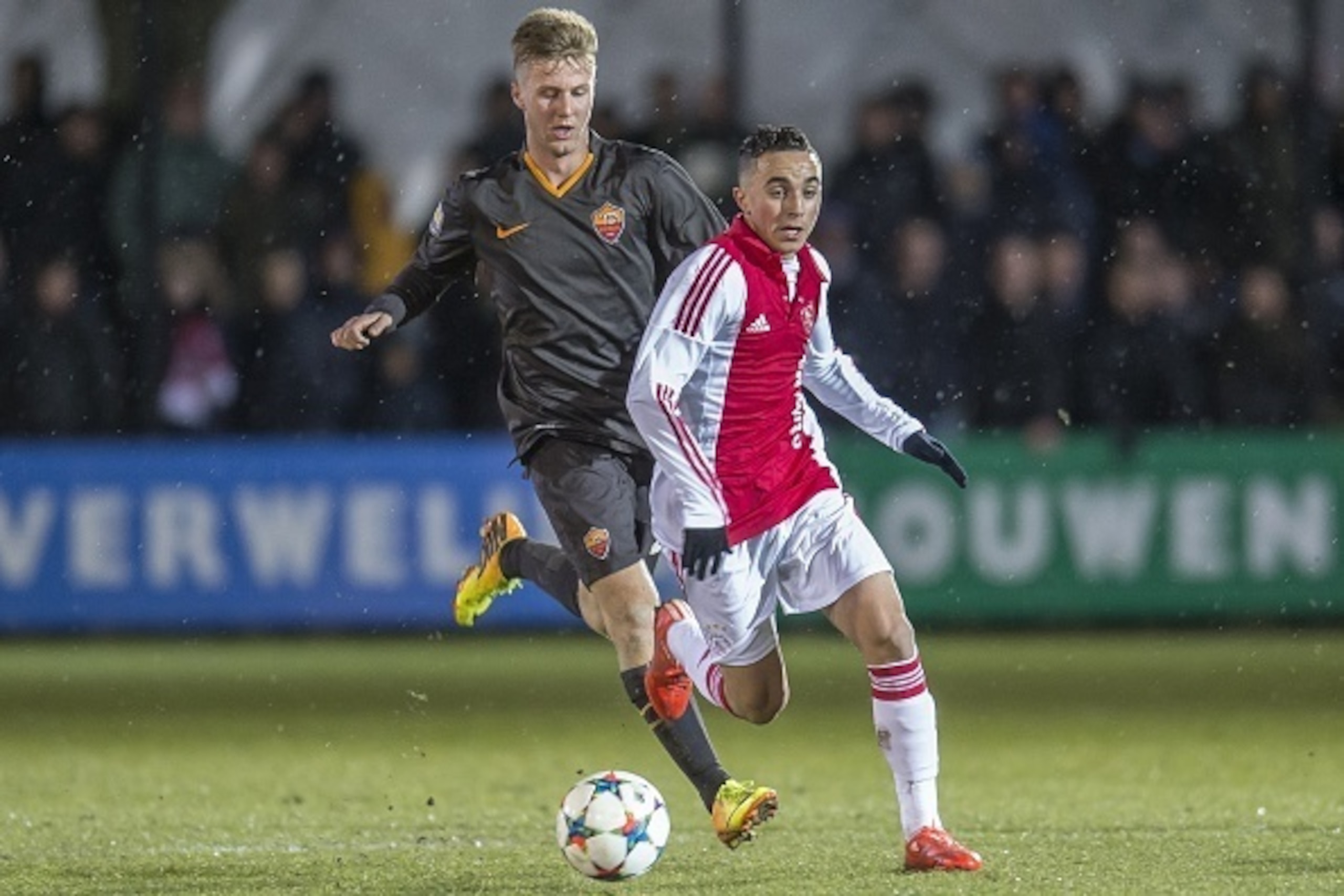 (L-R) Jose Machin Dicombo of AS Roma, Abdelhak Nouri of Ajax during the 1/8 final Europa Youth League match between Ajax U19 and AS Roma U19 on February 24, 2015 at De Toekomst in Amsterdam, The Netherlands.(Photo by VI Images via Getty Images)