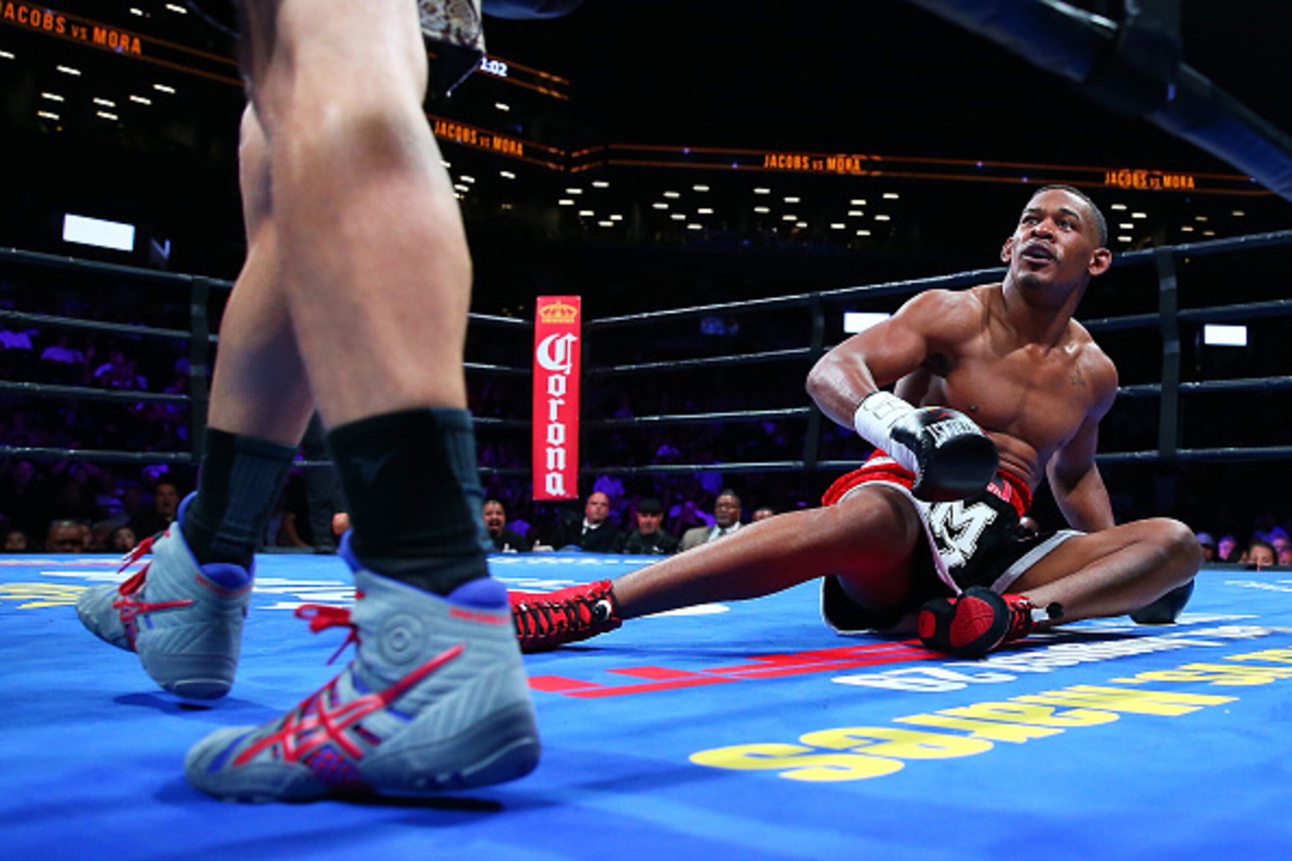 NEW YORK, NY - AUGUST 01:  Danny Jacobs looks on after being knock down by Sergio Mora in the first round during their middleweight bout at Barclays Center on August 1, 2015 in Brooklyn borough of New York City.  (Photo by Mike Stobe/Getty Images)