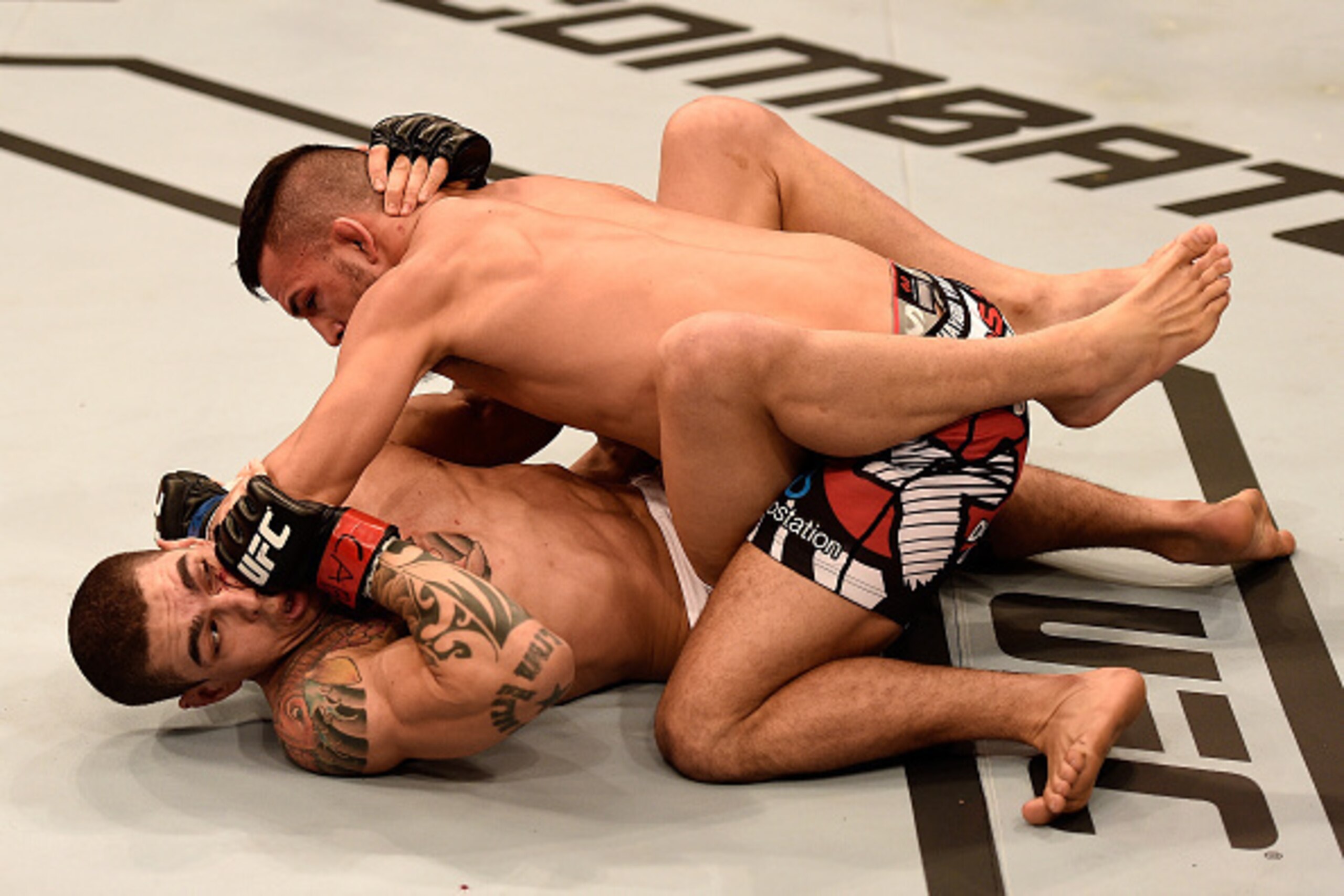 GOIANIA, BRAZIL - MAY 30:  Mirsad Bektic of Bosnia and Lucas Martins of Brazil in their featherweight UFC bout during the UFC Fight Night Condit v Alves at Arena Goiania on May 30, 2015 in Goiania.  (Photo by Buda Mendes/Zuffa LLC/Zuffa LLC via Getty Imag