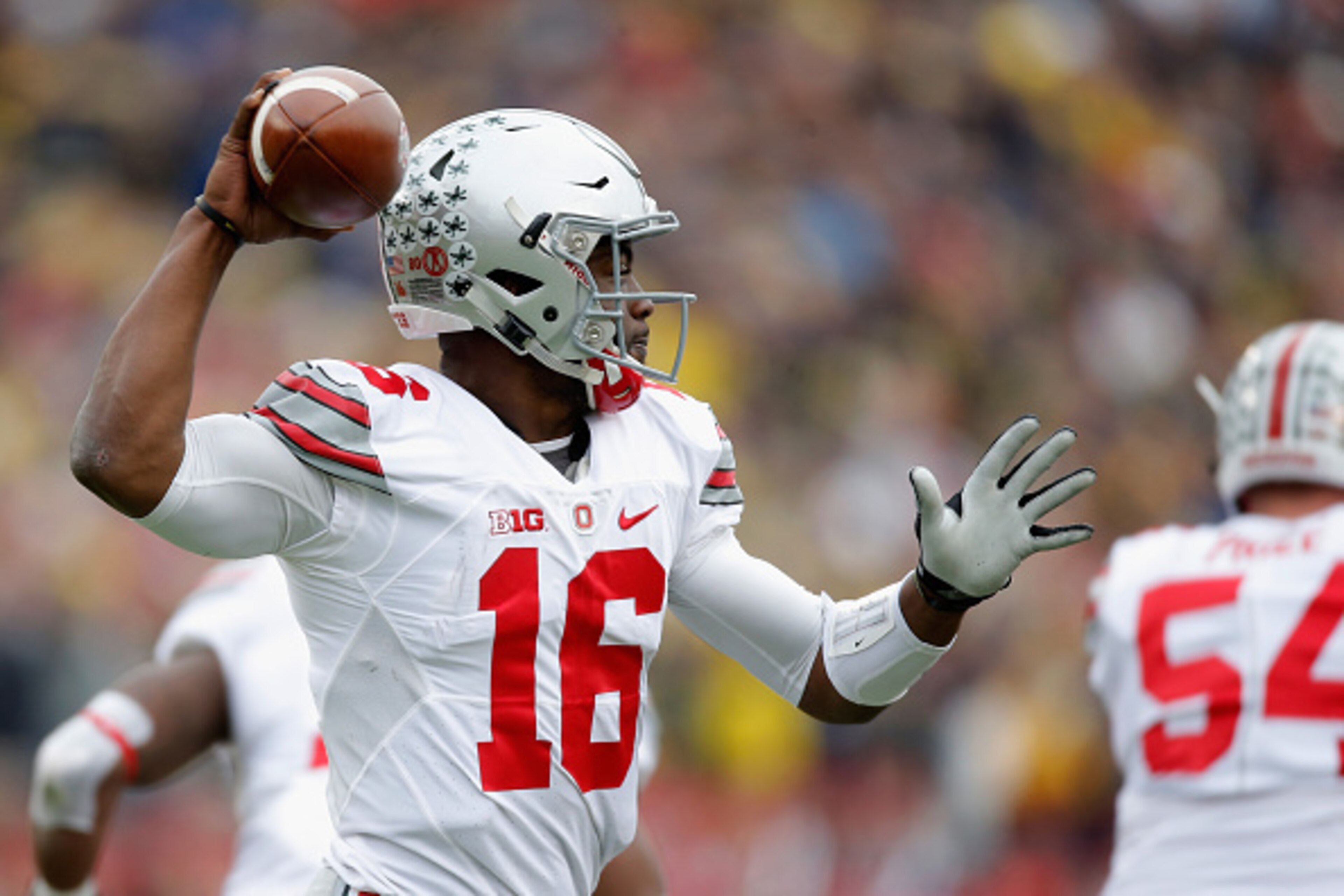 ANN ARBOR, MI - NOVEMBER 28: Quarterback J.T. Barrett #16 of the Ohio State Buckeyes throws a first half pass against the Michigan Wolverines at Michigan Stadium on November 28, 2015 in Ann Arbor, Michigan.  (Photo by Gregory Shamus/Getty Images)
