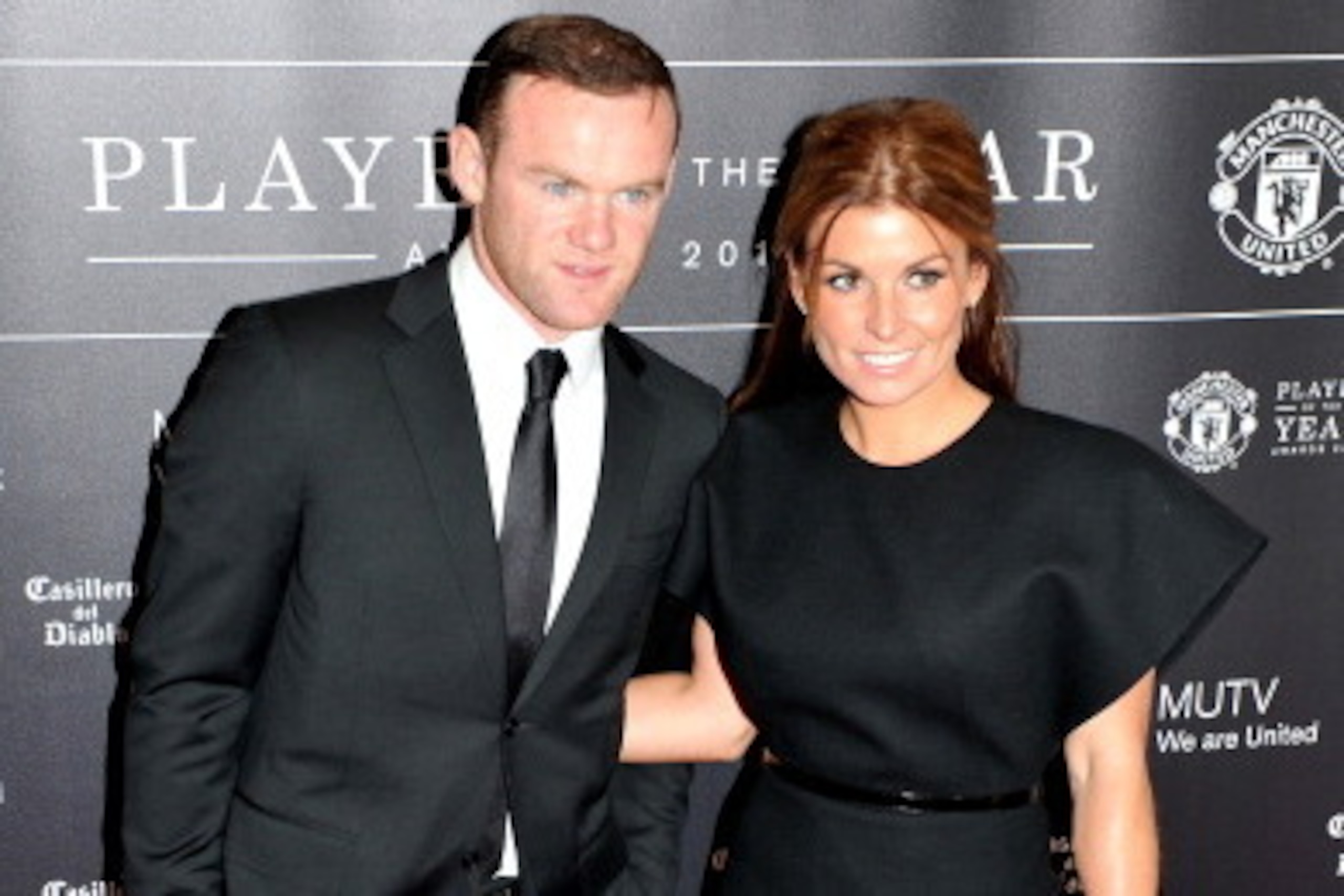 MANCHESTER, ENGLAND - MAY 08:  Wayne Rooney and Coleen Rooney attend the Manchester United Player of the Year awards at Old Trafford on May 8, 2014 in Manchester, England.  (Photo by Shirlaine Forrest/Getty Images)