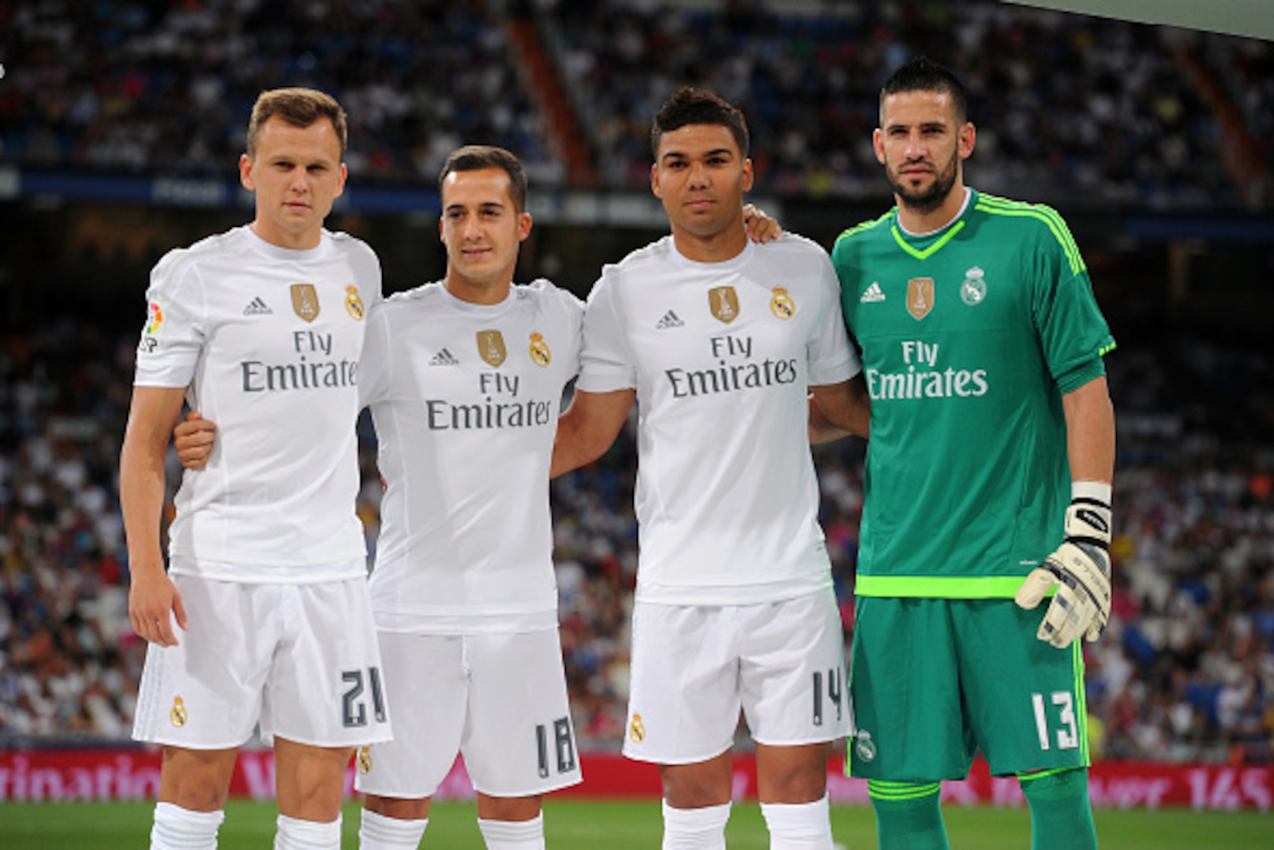 MADRID, SPAIN - AUGUST 18:  Real Madrid's new signings Denis Cheryshev, Lucas Vazquez, Carlos Casemiro and Kiko Casilla line-up for the Santiago Bernabeu Trophy match between Real Madrid and Galatasaray at Estadio Santiago Bernabeu on August 18, 2015 in M