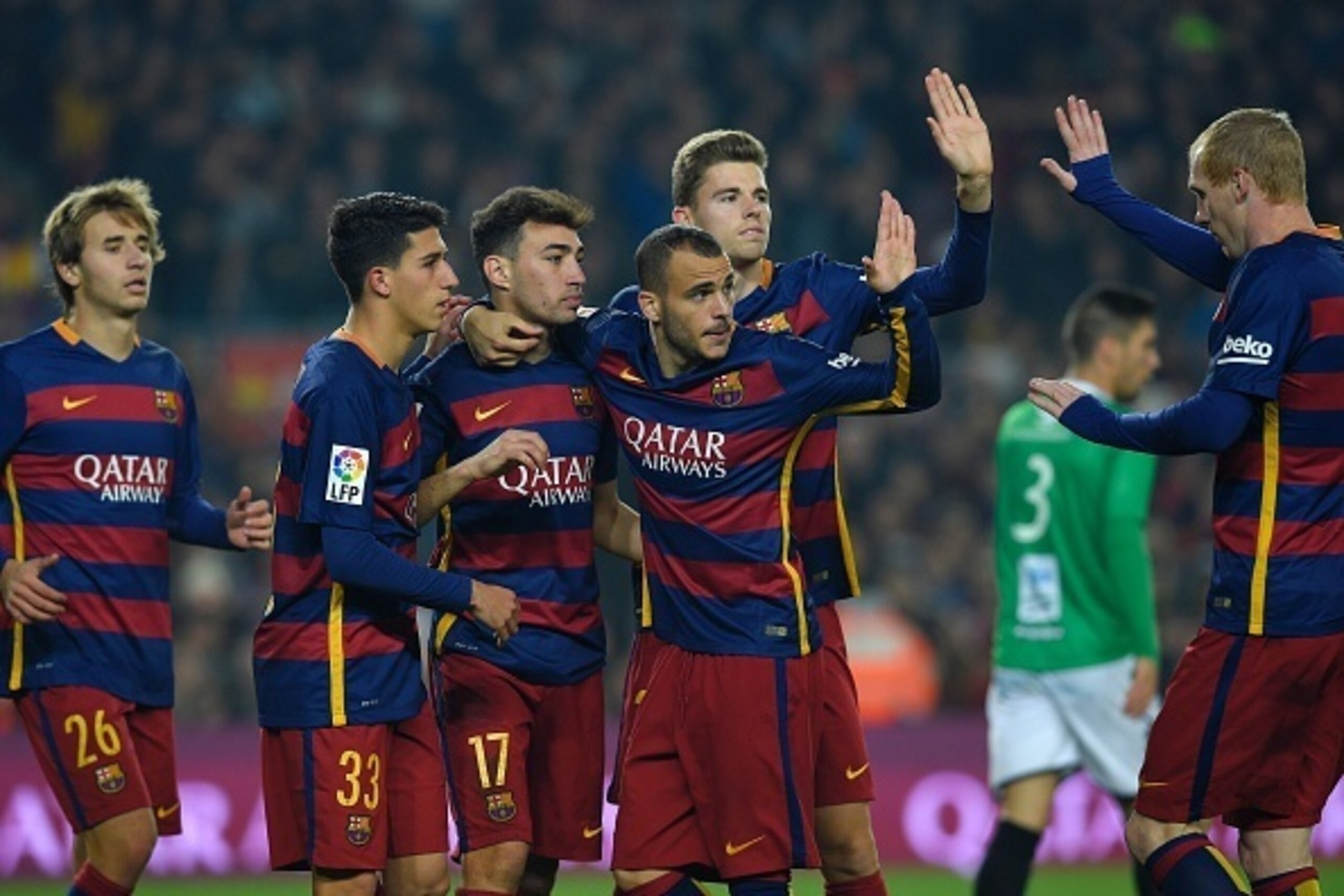 Barcelona's forward Munir El Haddadi (3-L) celebrates with Barcelona's midfielder Sergi Samper (L), Barcelona's forward Aitor Cantalapiedra (2-L), Barcelona's forward Sandro Ramirez (3-R), Barcelona's midfielder Gerard Gumbau (R-2) and Barcelona's French 