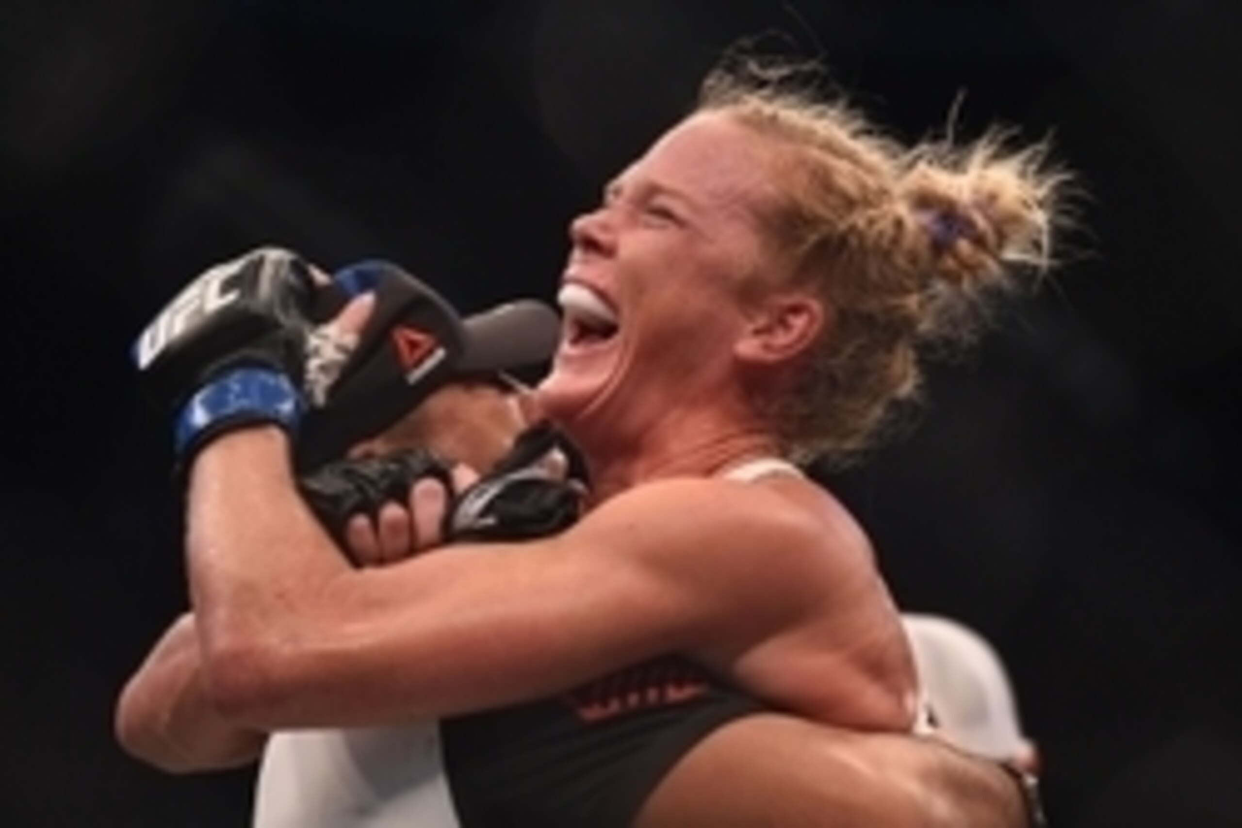 Nov 15, 2015; Melbourne, Australia; Holly Holm (blue gloves) celebrates after defeating Ronda Rousey (not pictured) during UFC 193 at Etihad Stadium. Mandatory Credit: Matt Roberts-USA TODAY Sports Nov 15, 2015; Melbourne, Australia; Holly Holm (blue gloves) celebrates after defeating Ronda Rousey (not pictured) during UFC 193 at Etihad Stadium. Mandatory Credit: Matt Roberts-USA TODAY Sports