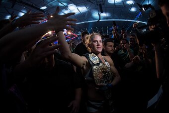 MELBOURNE, AUSTRALIA - NOVEMBER 15:  New UFC women's bantamweight champion Holly Holm of the United States celebrates her victory over Ronda Rousey of the United States during the UFC 193 event at Etihad Stadium on November 15, 2015 in Melbourne, Australi