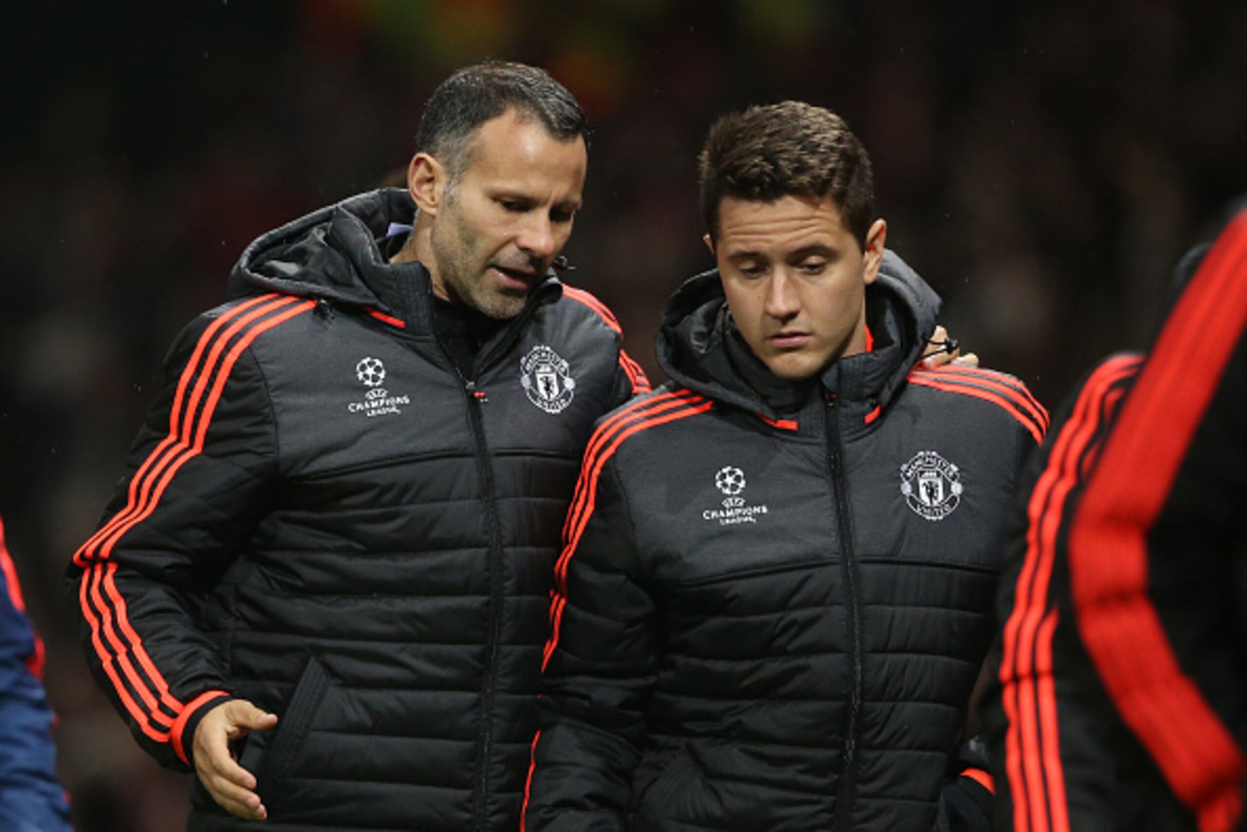 MANCHESTER, UNITED KINGDOM - NOVEMBER 03:  Ryan Giggs the assistant manager walks off with Ander Herrera of Manchester United at half time during the UEFA Champions League match on November 3, 2015 in Manchester, United Kingdom.  (Photo by Matthew Ashton 