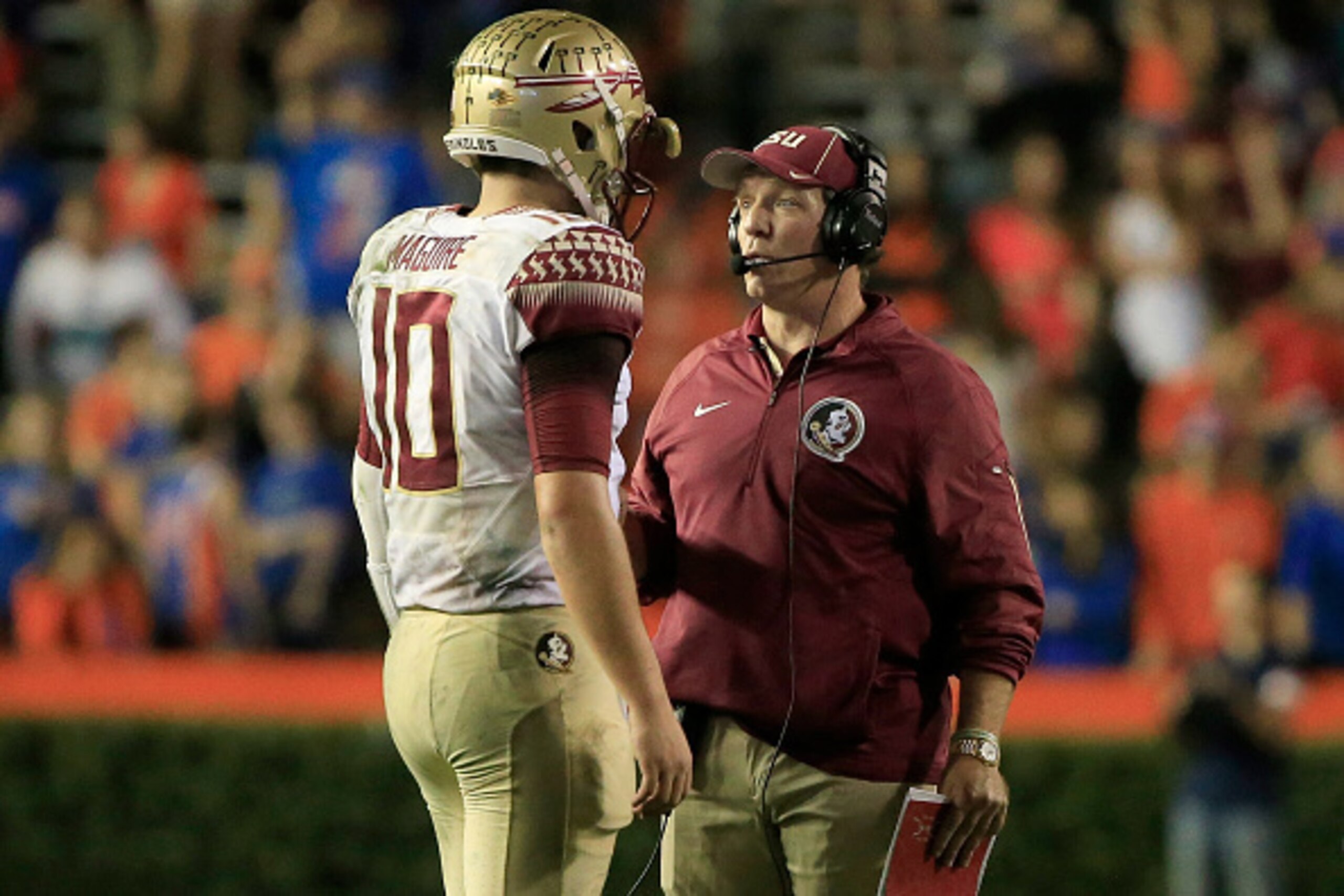 GAINESVILLE, FL - NOVEMBER 28:  Head coach Jimbo Fisher of the Florida State Seminoles speaks with Sean Maguire #10 during the game against the Florida Gators at Ben Hill Griffin Stadium on November 28, 2015 in Gainesville, Florida.  (Photo by Sam Greenwo