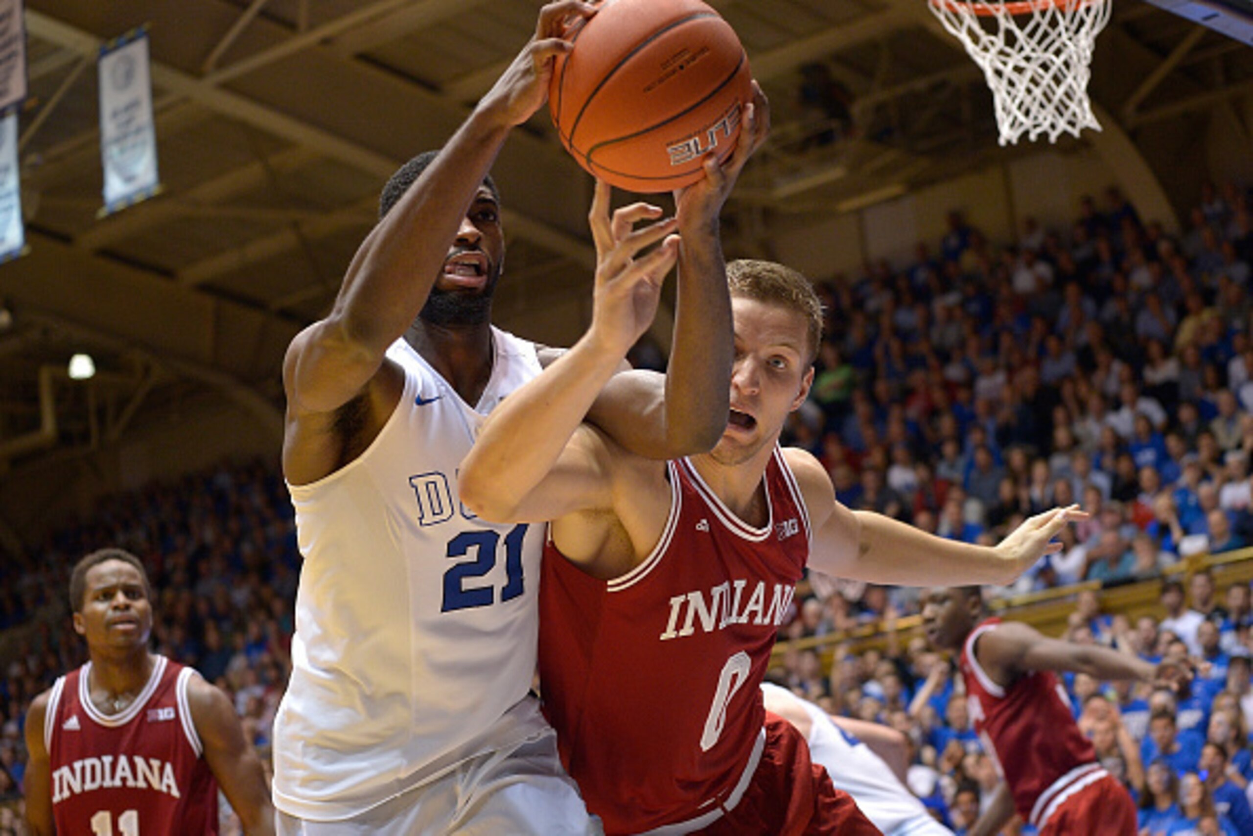 DURHAM, NC - DECEMBER 02: Amile Jefferson #21 of the Duke Blue Devils battles Max Bielfeldt #0 of the Indiana Hoosiers for a rebound during a game at Cameron Indoor Stadium on December 2, 2015 in Durham, North Carolina. Duke won 94-74. (Photo by Grant H DURHAM, NC - DECEMBER 02: Amile Jefferson #21 of the Duke Blue Devils battles Max Bielfeldt #0 of the Indiana Hoosiers for a rebound during a game at Cameron Indoor Stadium on December 2, 2015 in Durham, North Carolina. Duke won 94-74. (Photo by Grant H