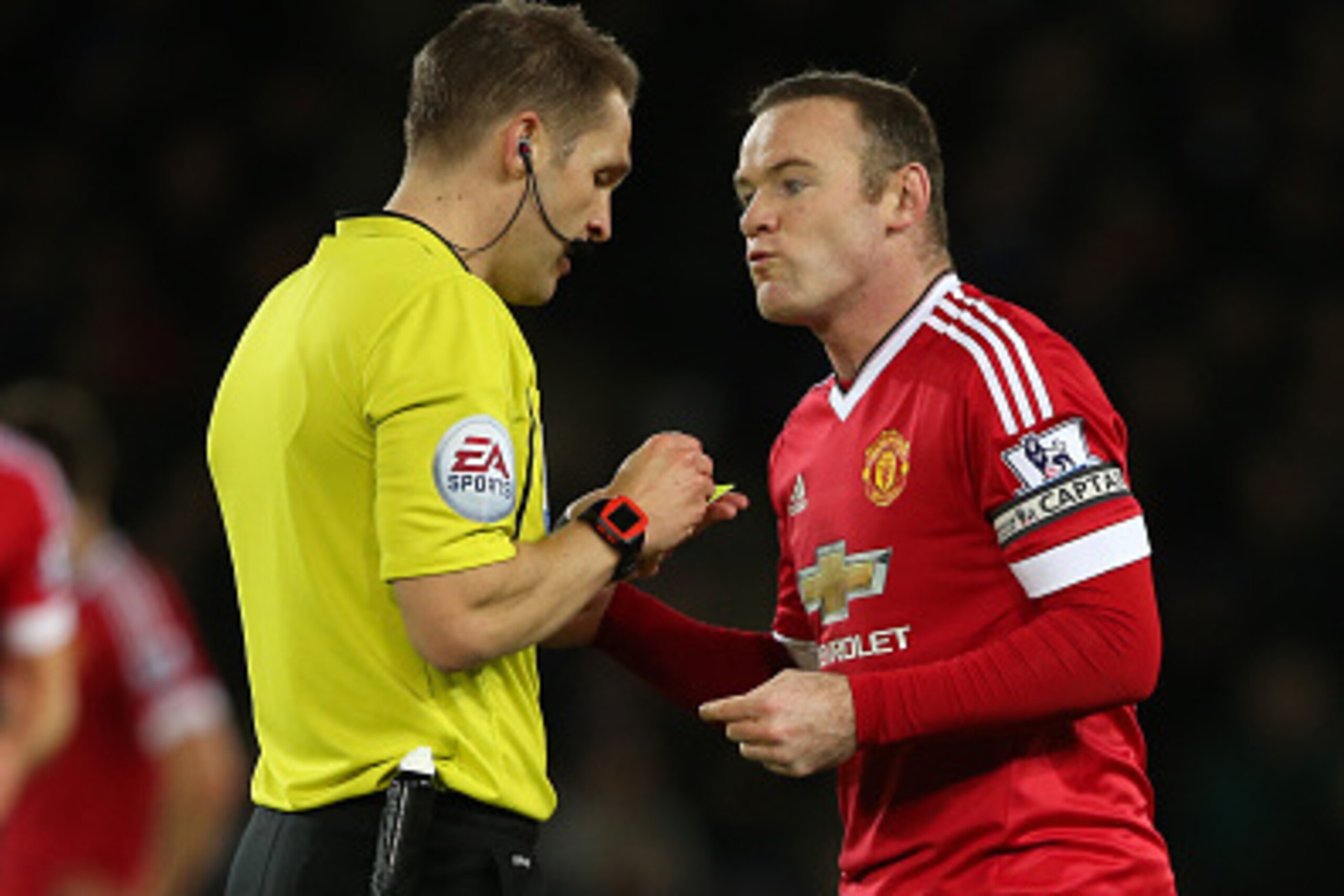 LEICESTER, ENGLAND - NOVEMBER 28:  Referee Craig Powson talks to Wayne Rooney of Manchester United during the Barclays Premier League match between Leicester City and Manchester United at The King Power Stadium on November 28, 2015 in Leicester, England. 