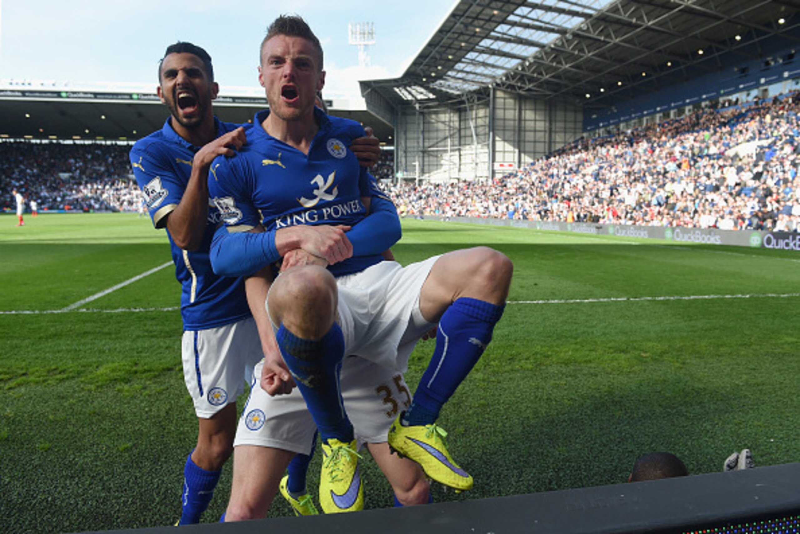 WEST BROMWICH, ENGLAND - APRIL 11:  Jamie Vardy of Leicester City (R) with Riyad Mahrez of Leicester City (L) celebrates scoring the third goal with team mates during the Barclays Premier League match between West Bromwich Albion and Leicester City at The