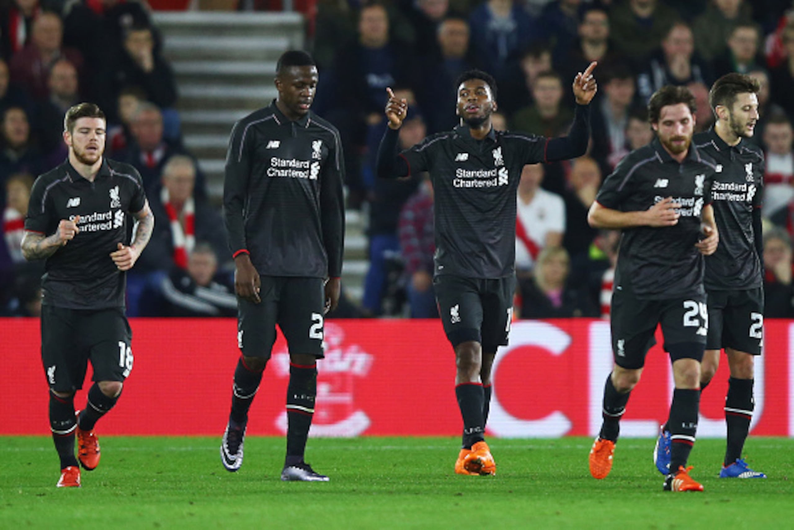 SOUTHAMPTON, ENGLAND - DECEMBER 02:  Daniel Sturridge of Liverpool (C) celebrates with team mates as as he scores their second goal during the Capital One Cup quarter final match between Southampton and Liverpool at St Mary's Stadium on December 2, 2015 i