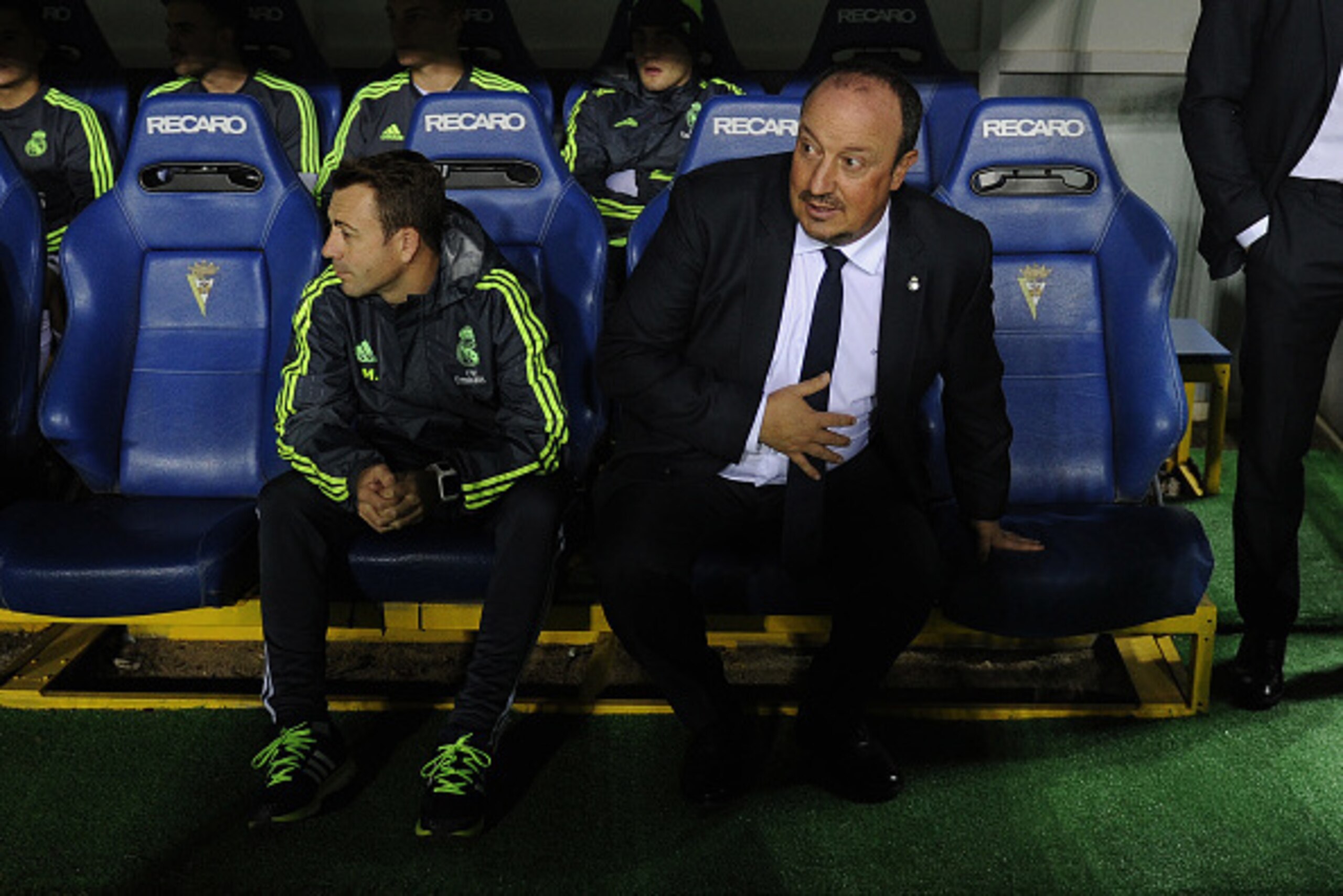 Real Madrid's coach Rafael Benitez (C) looks on before the match during the Spanish Copa del Rey (King's Cup) football match Cadiz CF vs Real Madrid at the Ramon de Carranza in Cadiz on December 2, 2015. AFP PHOTO / CRISTINA QUICLER / AFP / CRISTINA QUIC Real Madrid's coach Rafael Benitez (C) looks on before the match during the Spanish Copa del Rey (King's Cup) football match Cadiz CF vs Real Madrid at the Ramon de Carranza in Cadiz on December 2, 2015. AFP PHOTO / CRISTINA QUICLER / AFP / CRISTINA QUIC