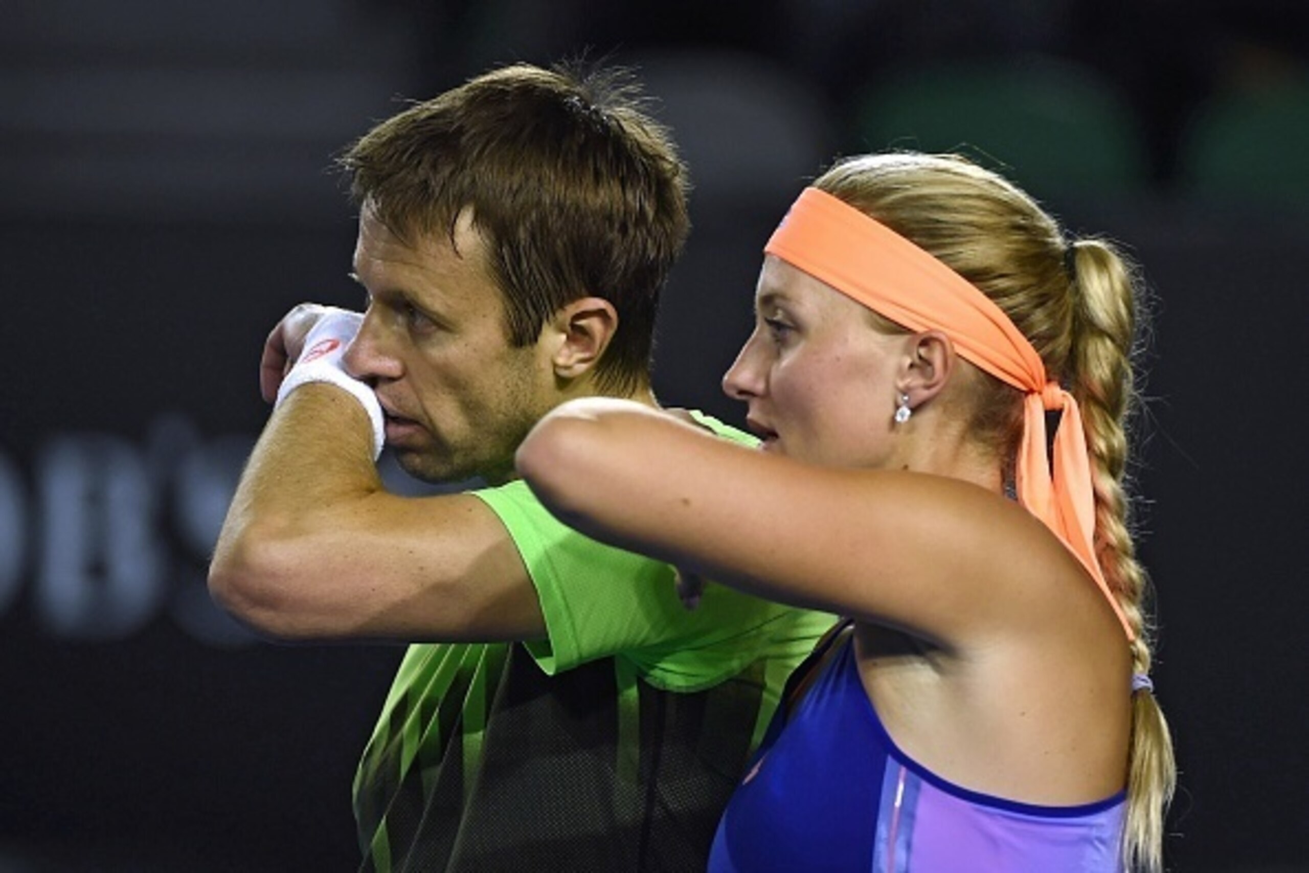 Kristina Mladenovic of France (R) and Daniel Nestor of Canada (R) gesture while playing against Martina Hingis of Switzerland and Leander Paes of India in their mixed doubles final match on day 14 of the 2015 Australian Open tennis tournament in Melbourne Kristina Mladenovic of France (R) and Daniel Nestor of Canada (R) gesture while playing against Martina Hingis of Switzerland and Leander Paes of India in their mixed doubles final match on day 14 of the 2015 Australian Open tennis tournament in Melbourne