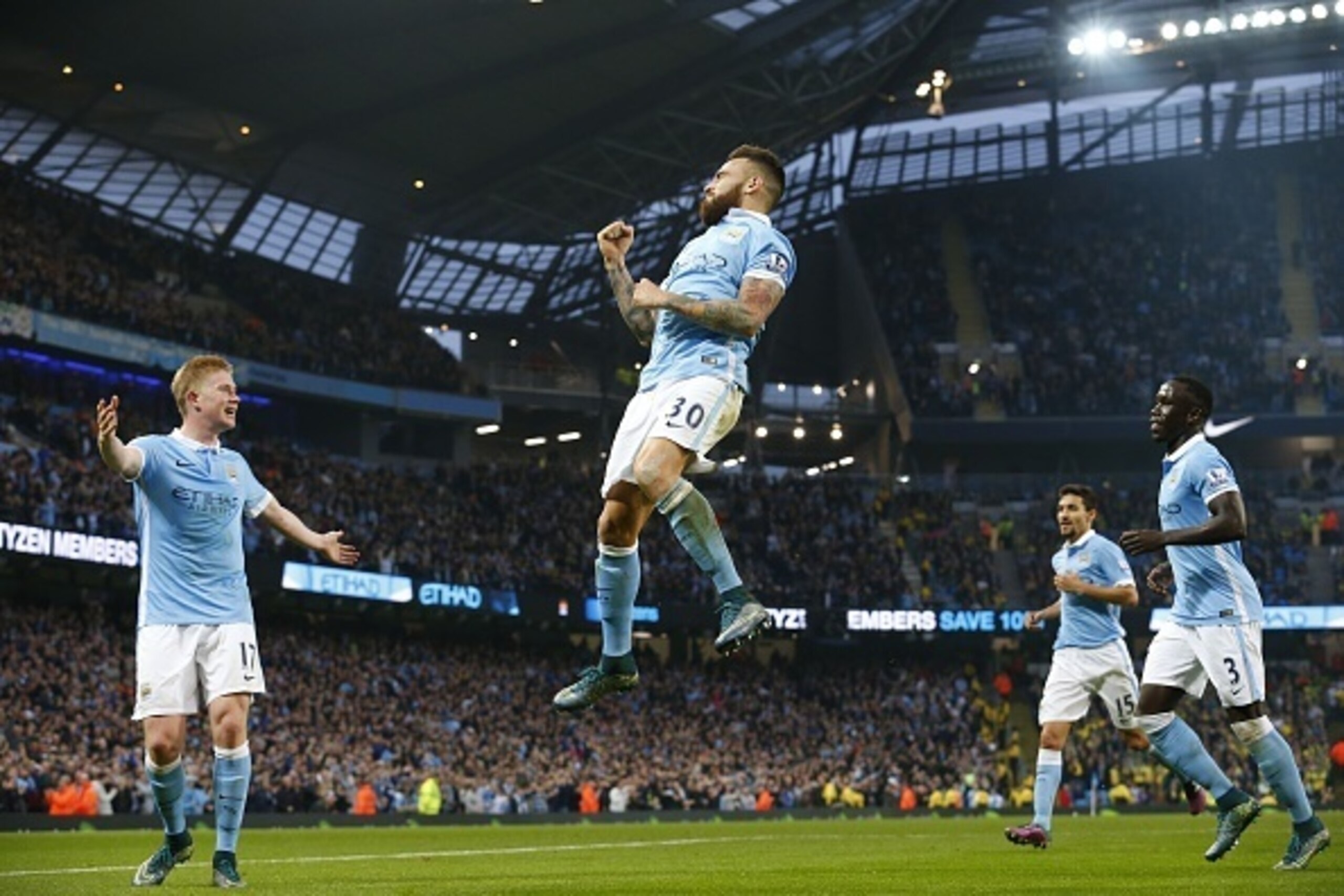 Manchester City's Argentinian defender Nicolas Otamendi (C) celebrates after scoring the opening goal of the English Premier League football match between Manchester City and Norwich City at The Etihad Stadium in Manchester, north west England on October Manchester City's Argentinian defender Nicolas Otamendi (C) celebrates after scoring the opening goal of the English Premier League football match between Manchester City and Norwich City at The Etihad Stadium in Manchester, north west England on October
