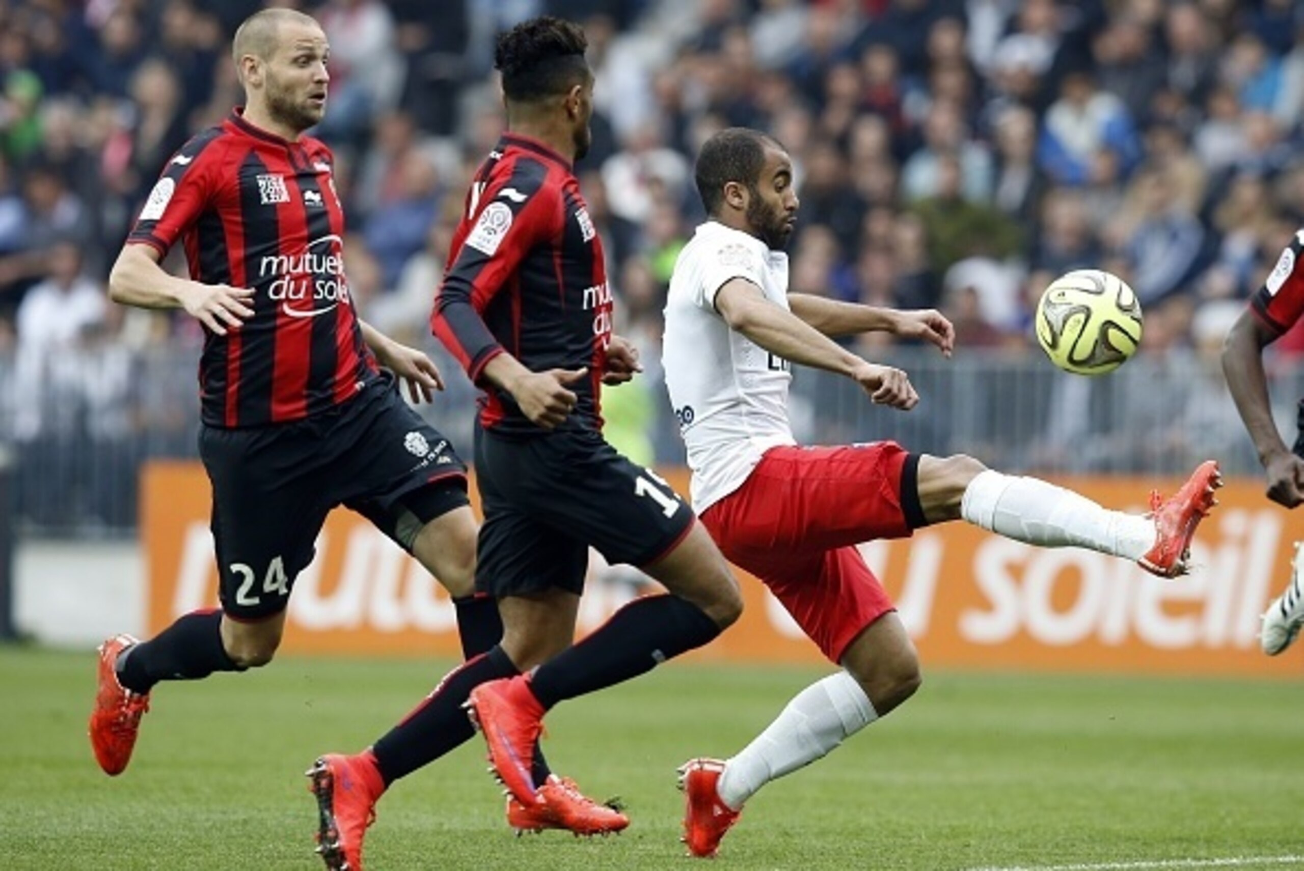 and Paris Saint-Germain's Brazilian midfielder Lucas Moura (R) vies with Nice's French midfielder Mathieu Bodmer (L) and Nice's French defender Jordan Amavi (C) during the French L1 football match Nice (OGC Nice) vs Paris Saint Germain (PSG) on April 18, and Paris Saint-Germain's Brazilian midfielder Lucas Moura (R) vies with Nice's French midfielder Mathieu Bodmer (L) and Nice's French defender Jordan Amavi (C) during the French L1 football match Nice (OGC Nice) vs Paris Saint Germain (PSG) on April 18,