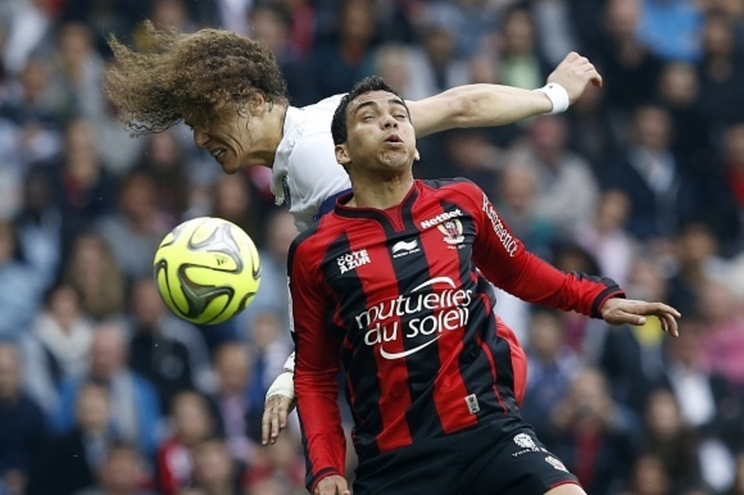 Paris Saint-Germain's Brazilian defender David Luiz (R) vies with Nice's Brazilian midfielder Carlos Eduardo (L) during the French L1 football match between Nice and Paris on April 18, 2015 at the Allianz Riviera stadium in Nice, southeastern France. AFP Paris Saint-Germain's Brazilian defender David Luiz (R) vies with Nice's Brazilian midfielder Carlos Eduardo (L) during the French L1 football match between Nice and Paris on April 18, 2015 at the Allianz Riviera stadium in Nice, southeastern France. AFP